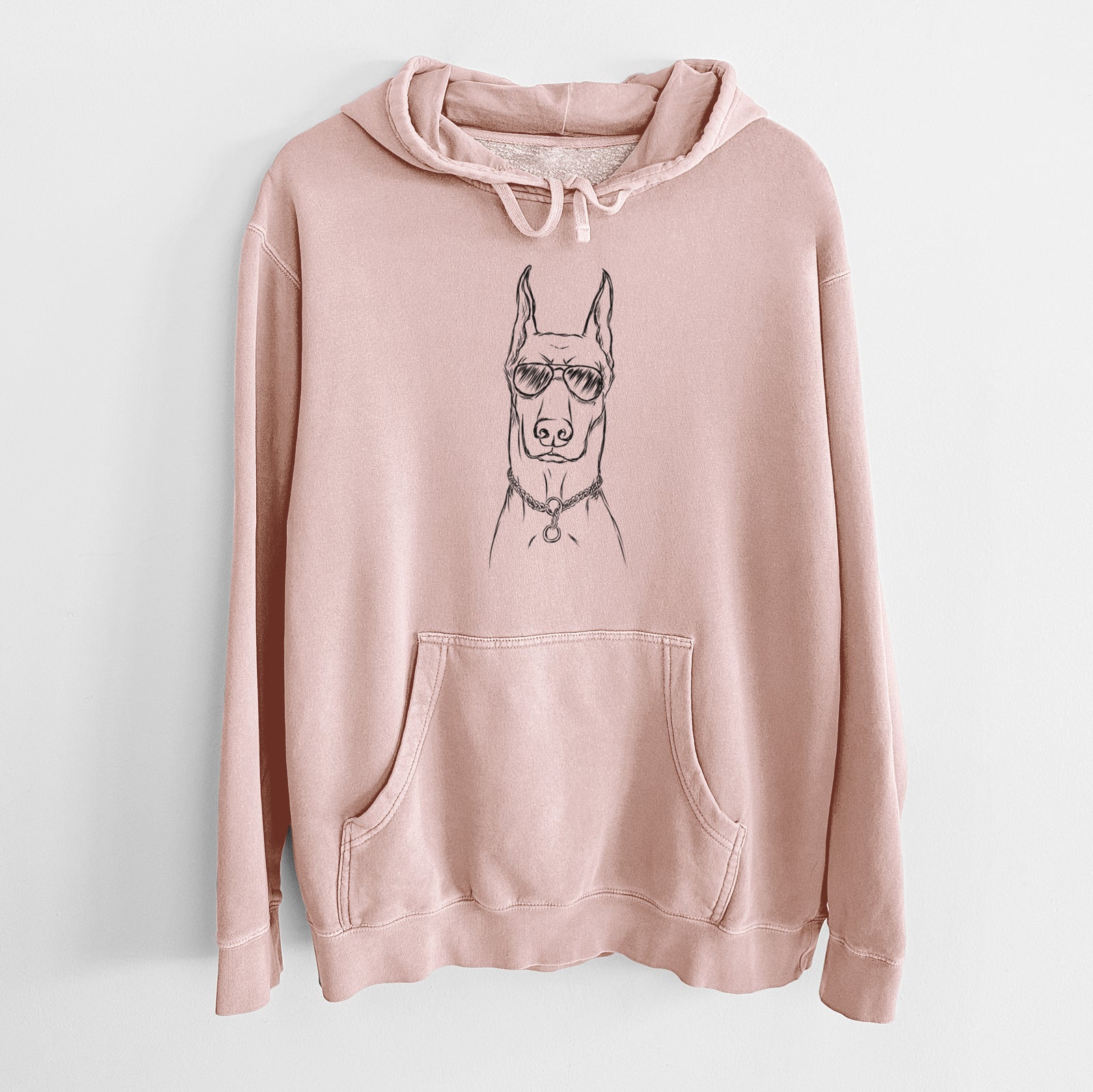 Hand-drawn sketch of Ace the Doberman Pinscher wearing aviator sunglasses on a Dusty Pink Unisex pigment dyed hoodie