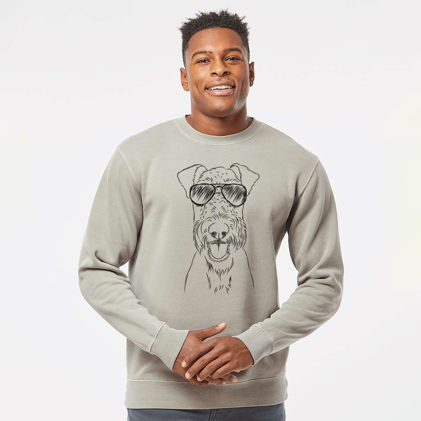 Hand-drawn sketch of Andy the Airedale Terrier wearing aviator sunglasses on a Cement Unisex pigment dyed crew sweatshirt