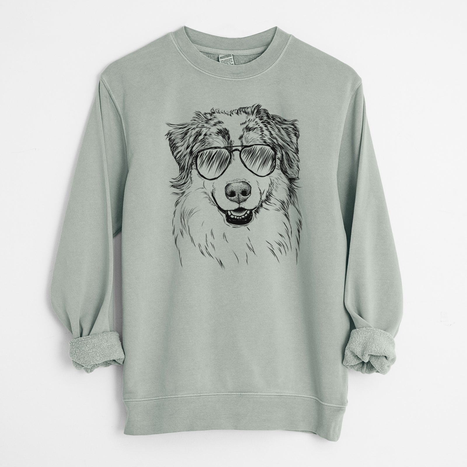 Hand-drawn sketch of Aonghus the Australian Shepherd wearing aviator sunglasses on a Sage Unisex pigment dyed crew sweatshirt