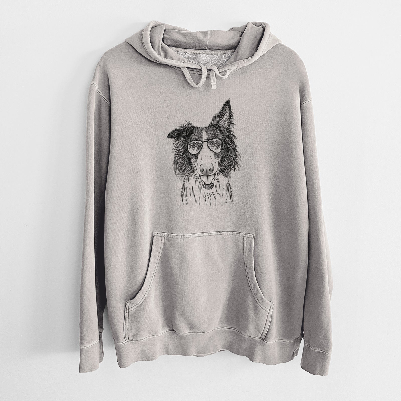 Hand-drawn sketch of Archie the Silken Windhound wearing aviator sunglasses on a Cement Unisex pigment dyed hoodie
