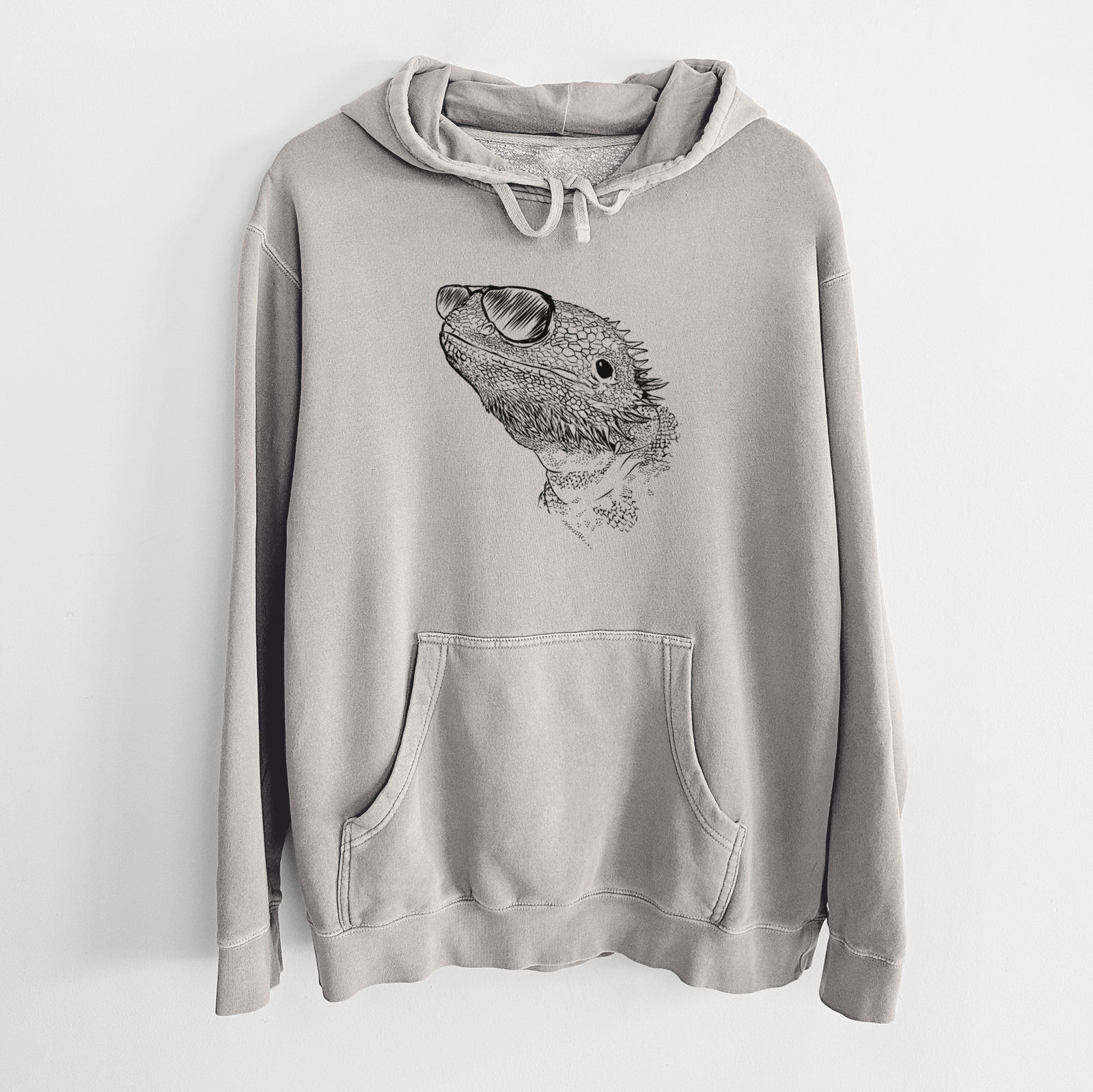 Hand-drawn sketch of Ash the Bearded Dragon wearing aviator sunglasses on a Cement Unisex pigment dyed hoodie