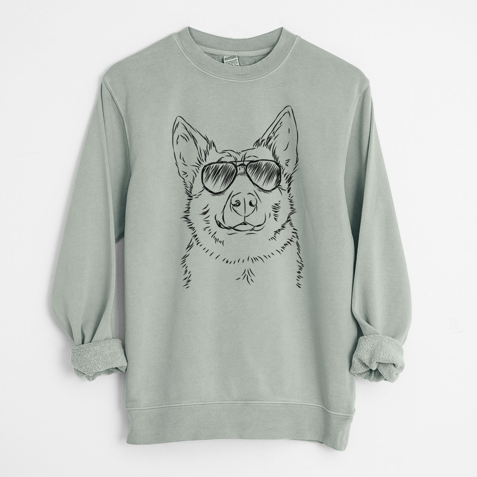 Hand-drawn sketch of Austin the Heeler wearing aviator sunglasses on a Sage Unisex pigment dyed crew sweatshirt