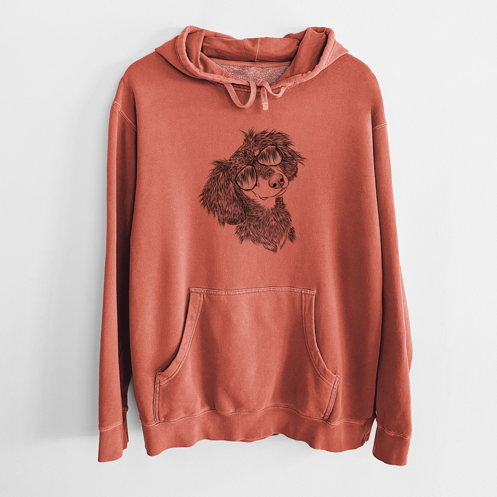 Hand-drawn sketch of Bailey the Long Haired Dachshund wearing aviator sunglasses on an Amber Unisex pigment dyed hoodie