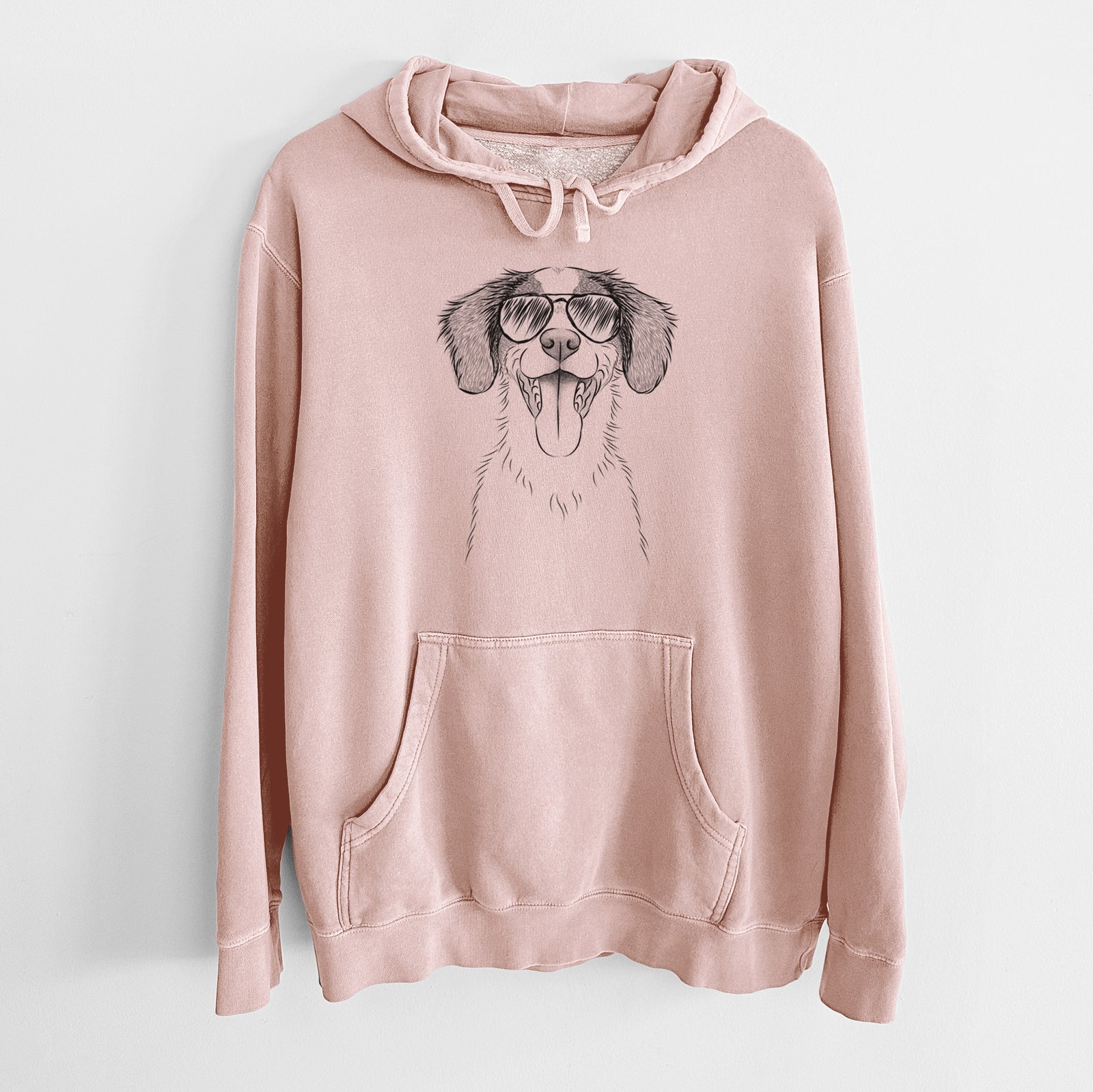 Hand-drawn sketch of Birdie the Brittany wearing aviator sunglasses on a Dusty Pink Unisex pigment dyed hoodie