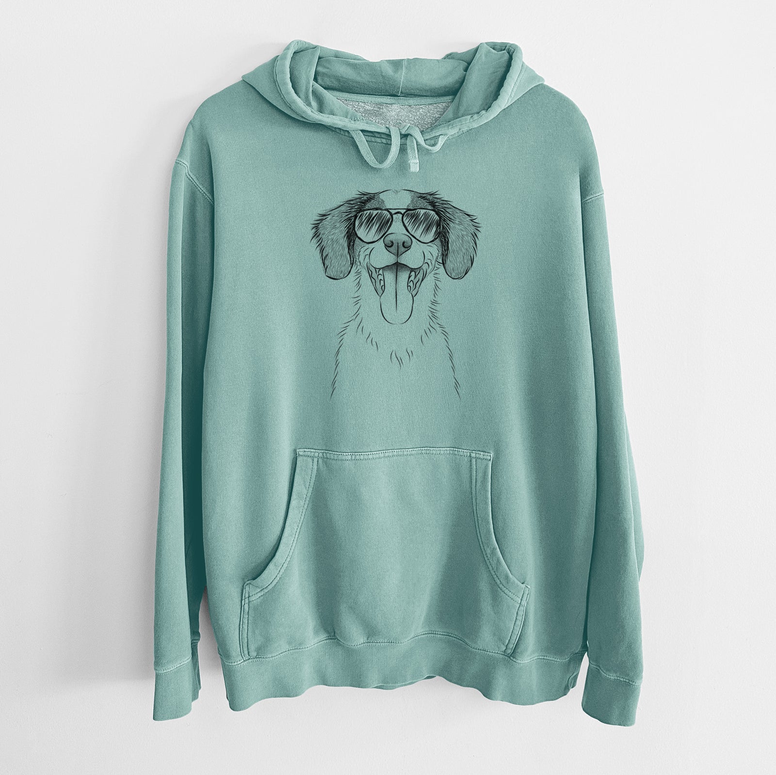 Hand-drawn sketch of Birdie the Brittany wearing aviator sunglasses on a Mint Unisex pigment dyed hoodie
