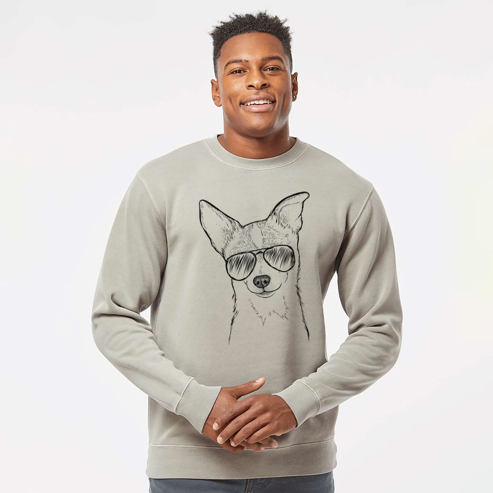 Hand-drawn sketch of Buggy the Chihuahua wearing aviator sunglasses on a Cement Unisex pigment dyed crew sweatshirt