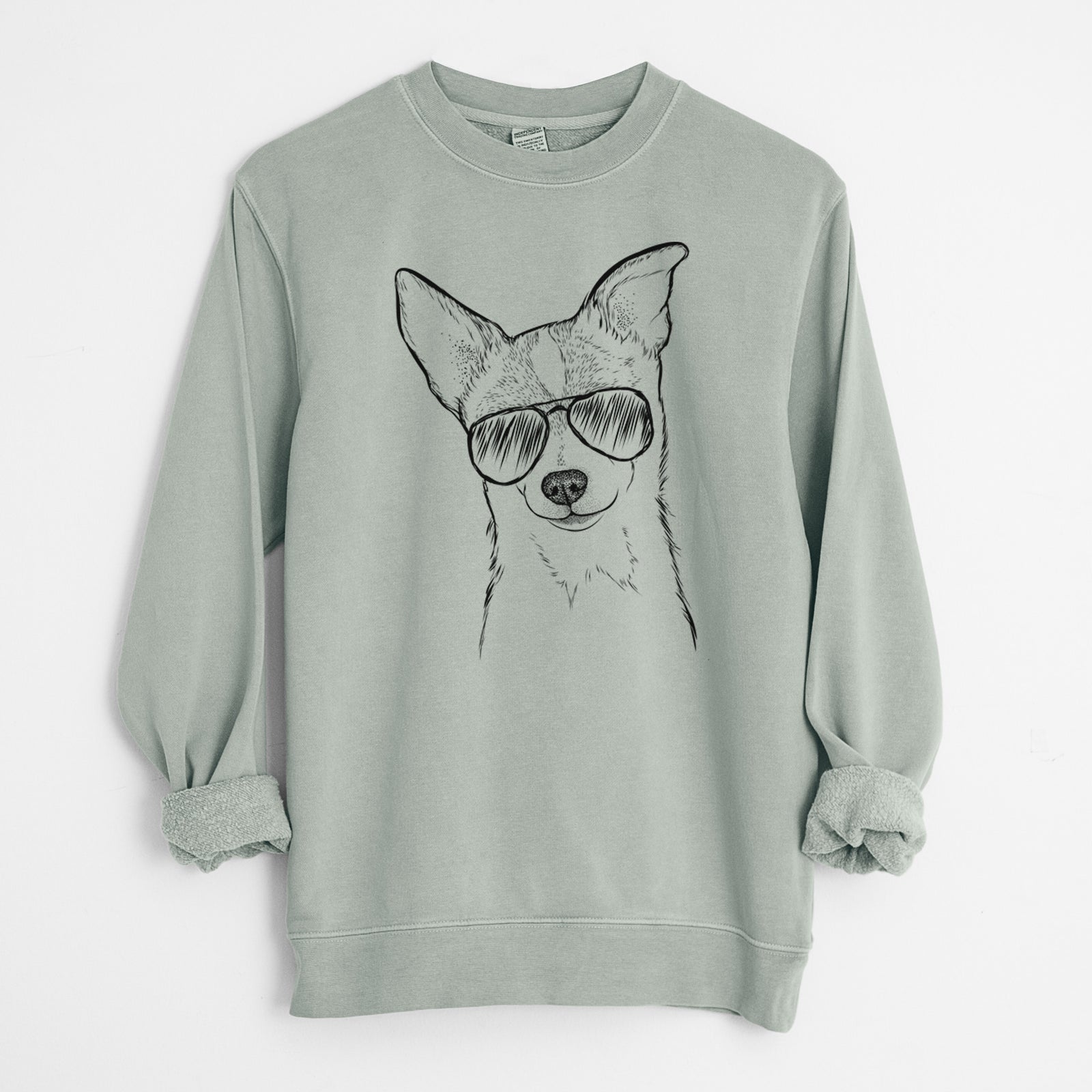 Hand-drawn sketch of Buggy the Chihuahua wearing aviator sunglasses on a Sage Unisex pigment dyed crew sweatshirt