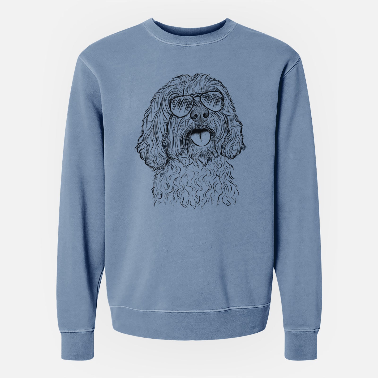 Hand-drawn sketch of Cali the Cavapoo wearing aviator sunglasses on a Slate Blue Unisex pigment dyed crew sweatshirt