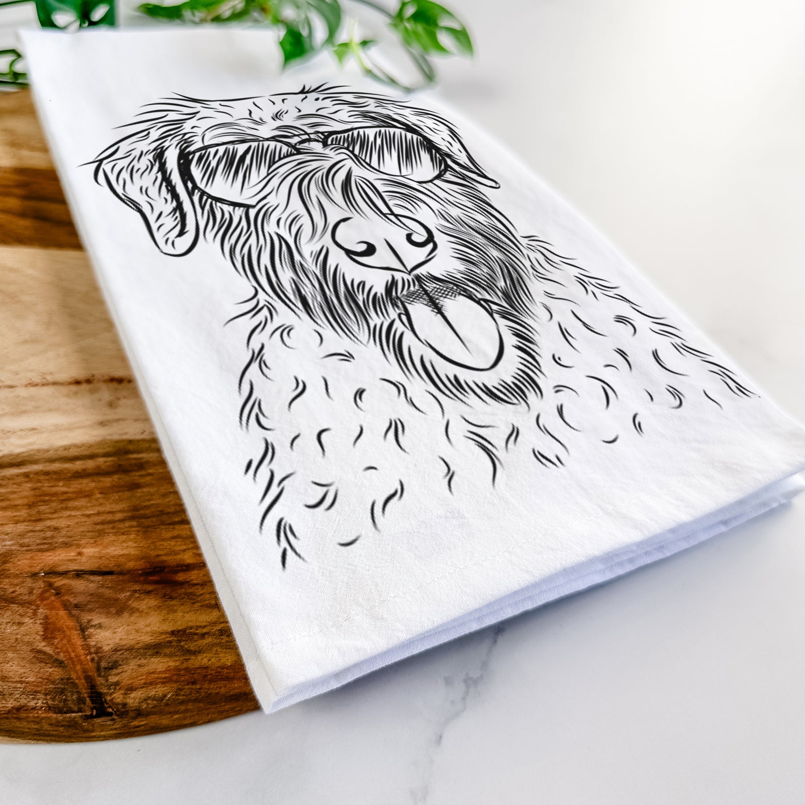 Hand-drawn sketch of Chester the Soft Coated Wheaten Terrier wearing aviator sunglasses on a tea towel