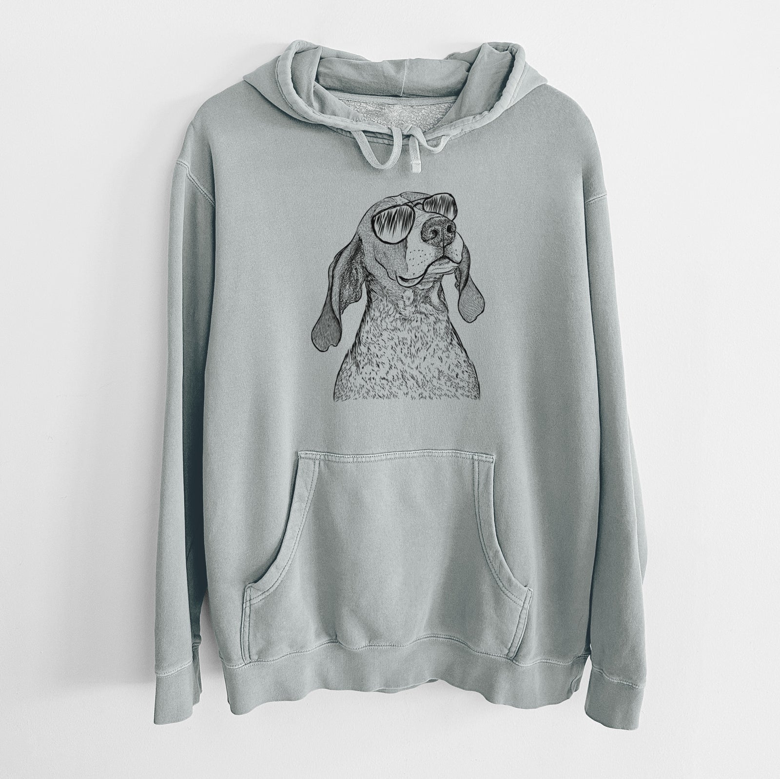 Hand-drawn sketch of Chester the Red Tick Coonhound wearing aviator sunglasses on a Sage Unisex pigment dyed hoodie
