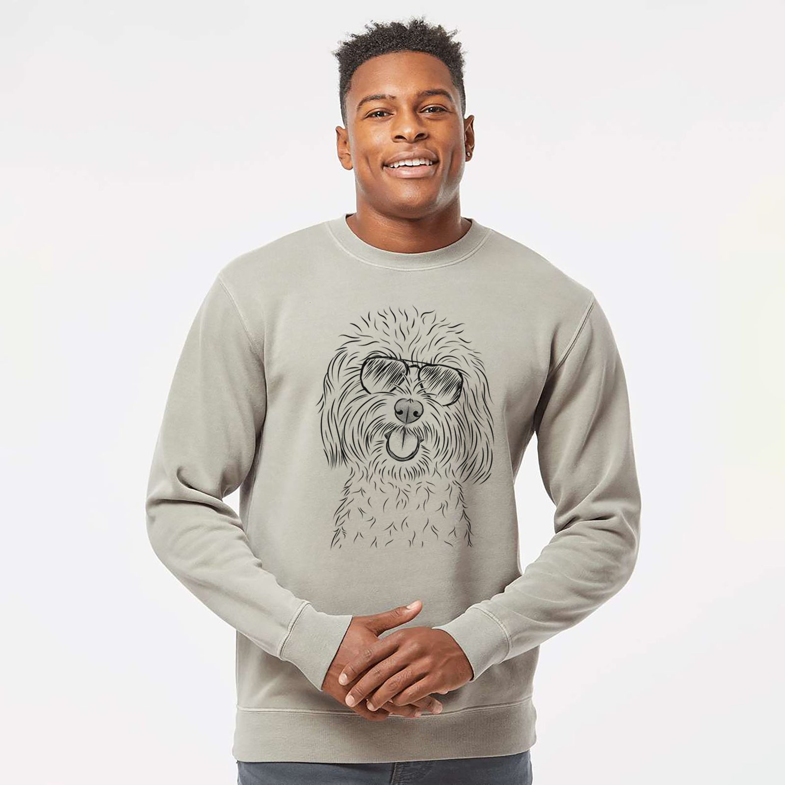 Hand-drawn sketch of Cuddles the Coton de Tulear wearing aviator sunglasses on a Cement Unisex pigment dyed crew sweatshirt