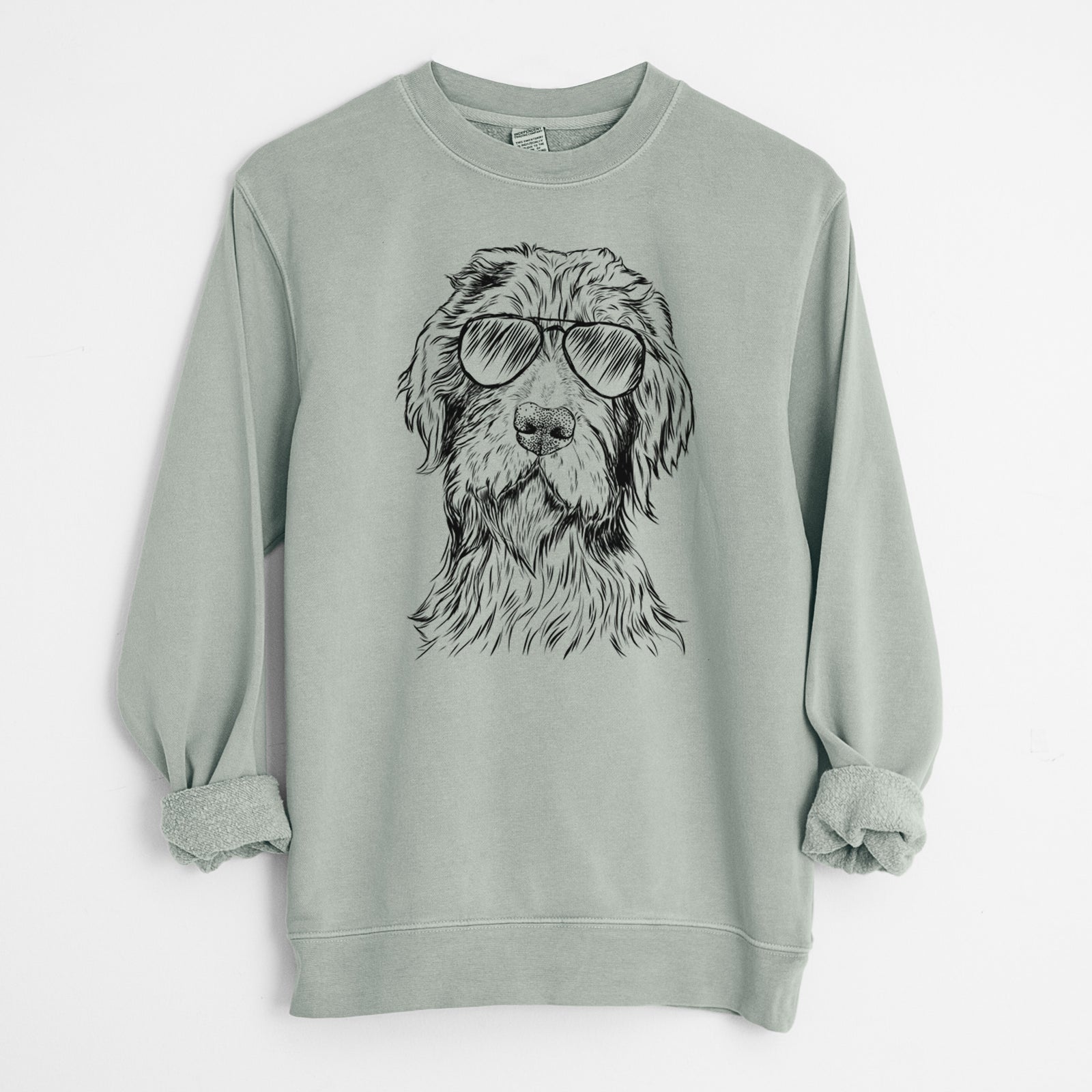Hand-drawn sketch of Doc Holliday the Pudelpointer wearing aviator sunglasses on a Sage Unisex pigment dyed crew sweatshirt