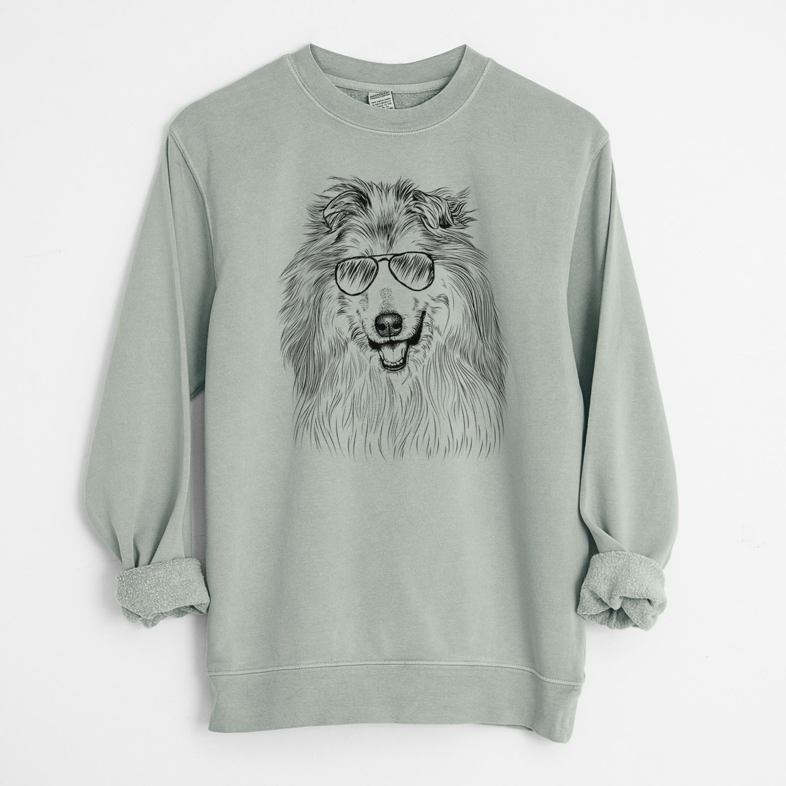 Hand-drawn sketch of Donnan the Rough Collie wearing aviator sunglasses on a Sage Unisex pigment dyed crew sweatshirt