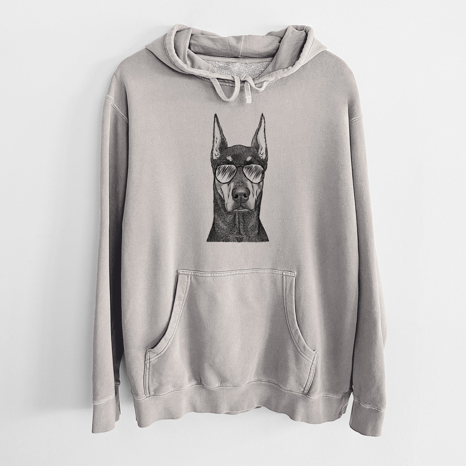 Hand-drawn sketch of Drake the Doberman Pinscher wearing aviator sunglasses on a Cement Unisex pigment dyed hoodie