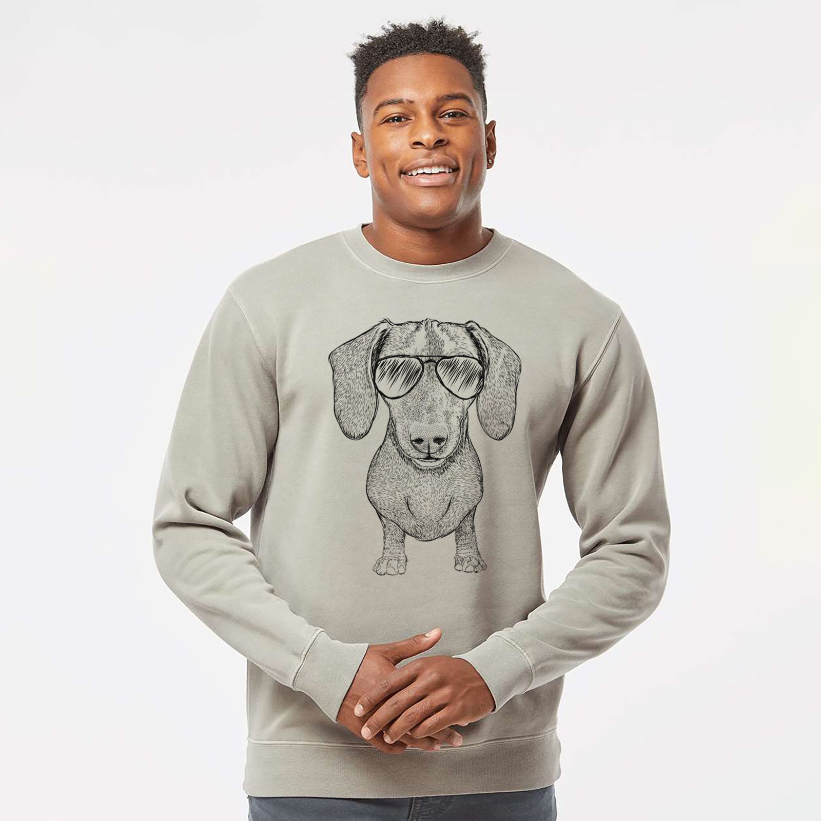 Hand-drawn sketch of Ernie the Mini Dachshund wearing aviator sunglasses on a Cement Unisex pigment dyed crew sweatshirt