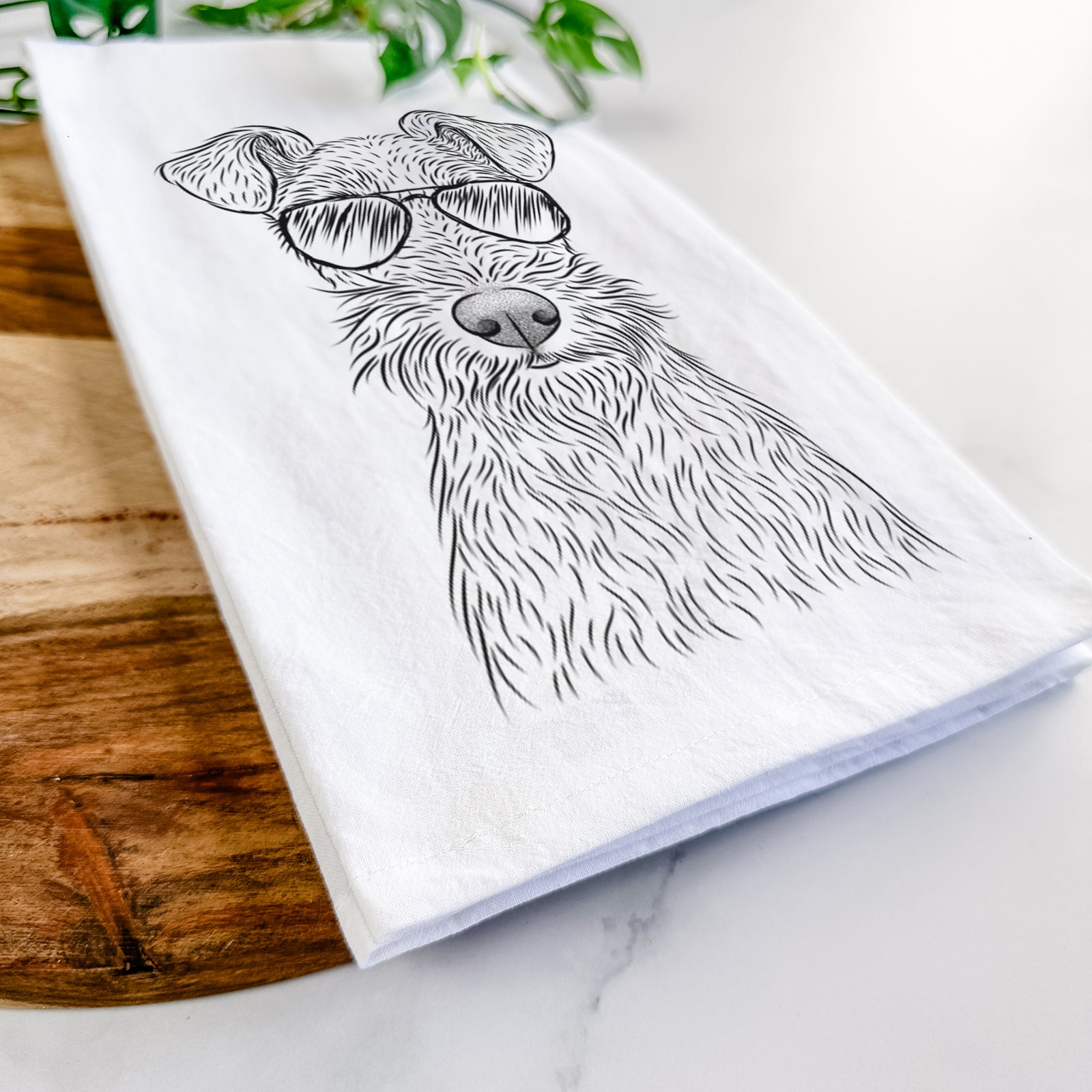 Hand-drawn sketch of Fitz the Wire Fox Terrier wearing aviator sunglasses on a tea towel