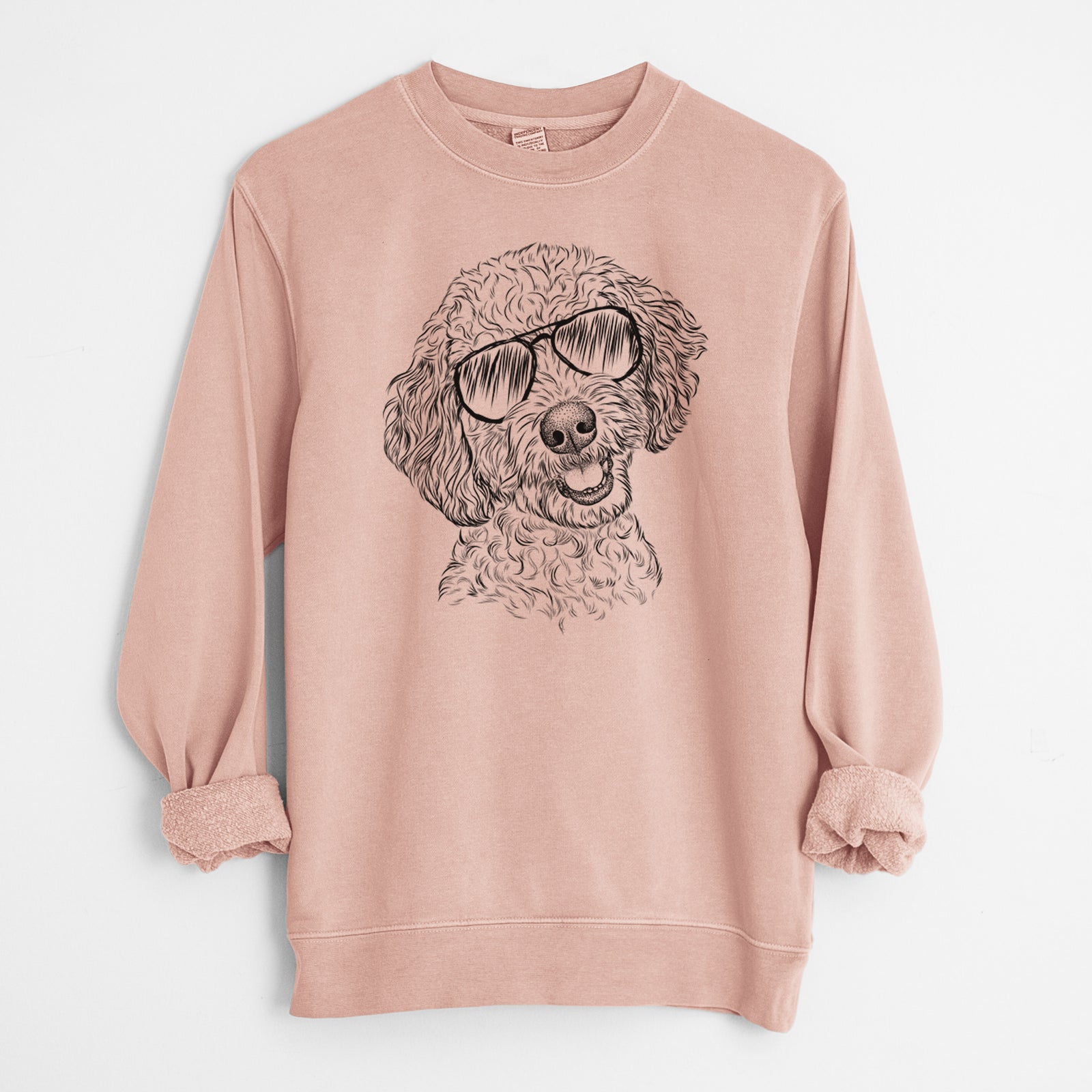 Hand-drawn sketch of Gizmo the Goldendoodle wearing aviator sunglasses on a Dusty Pink Unisex pigment dyed crew sweatshirt