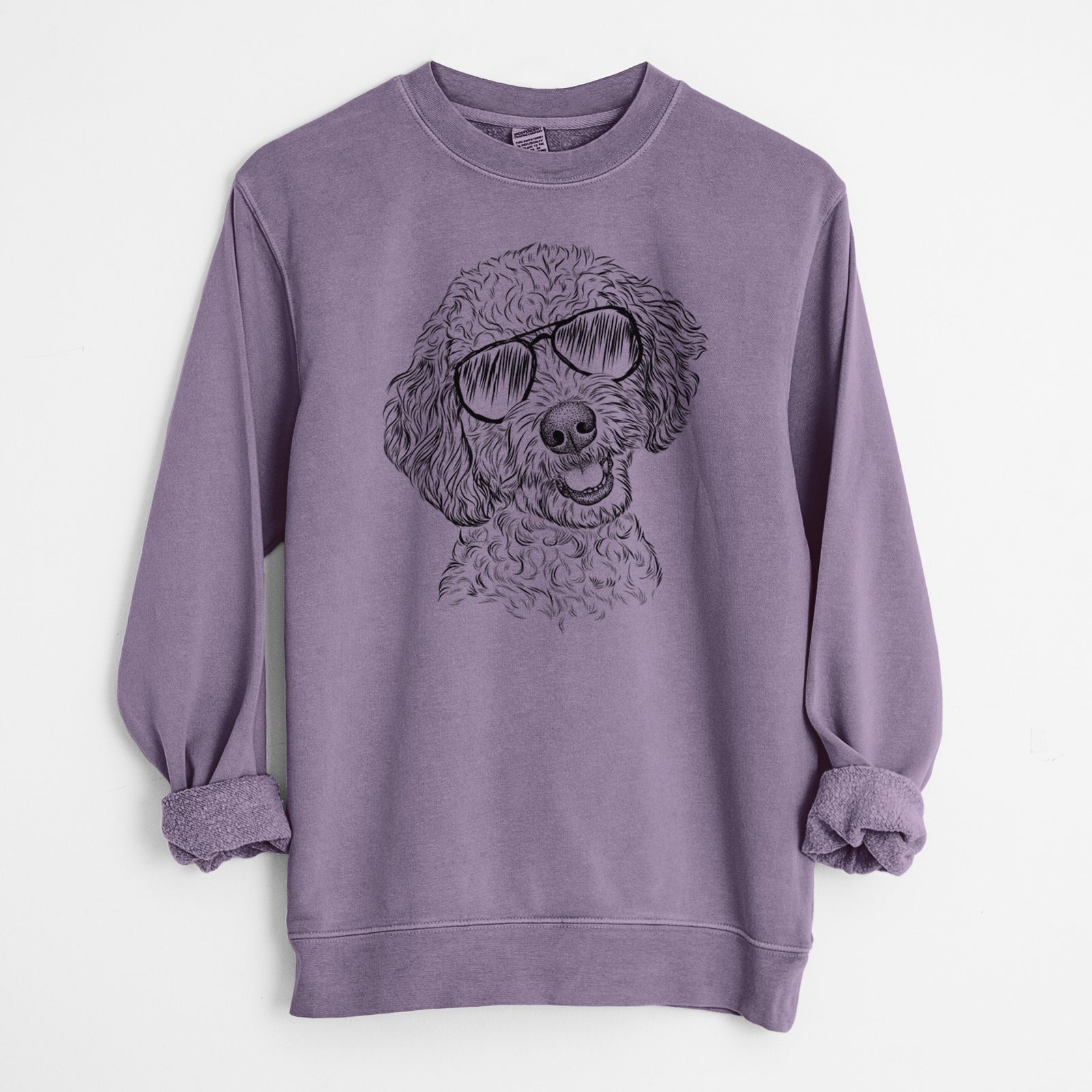Hand-drawn sketch of Gizmo the Goldendoodle wearing aviator sunglasses on a Plum Unisex pigment dyed crew sweatshirt