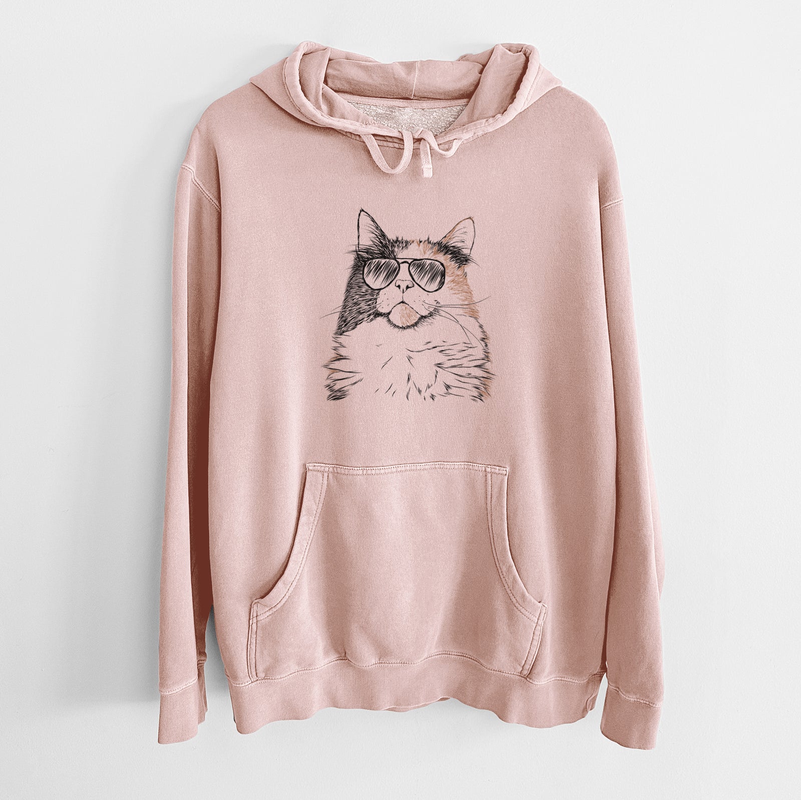 Hand-drawn sketch of Greta the Calico Cat wearing aviator sunglasses on a Dusty Pink Unisex pigment dyed hoodie