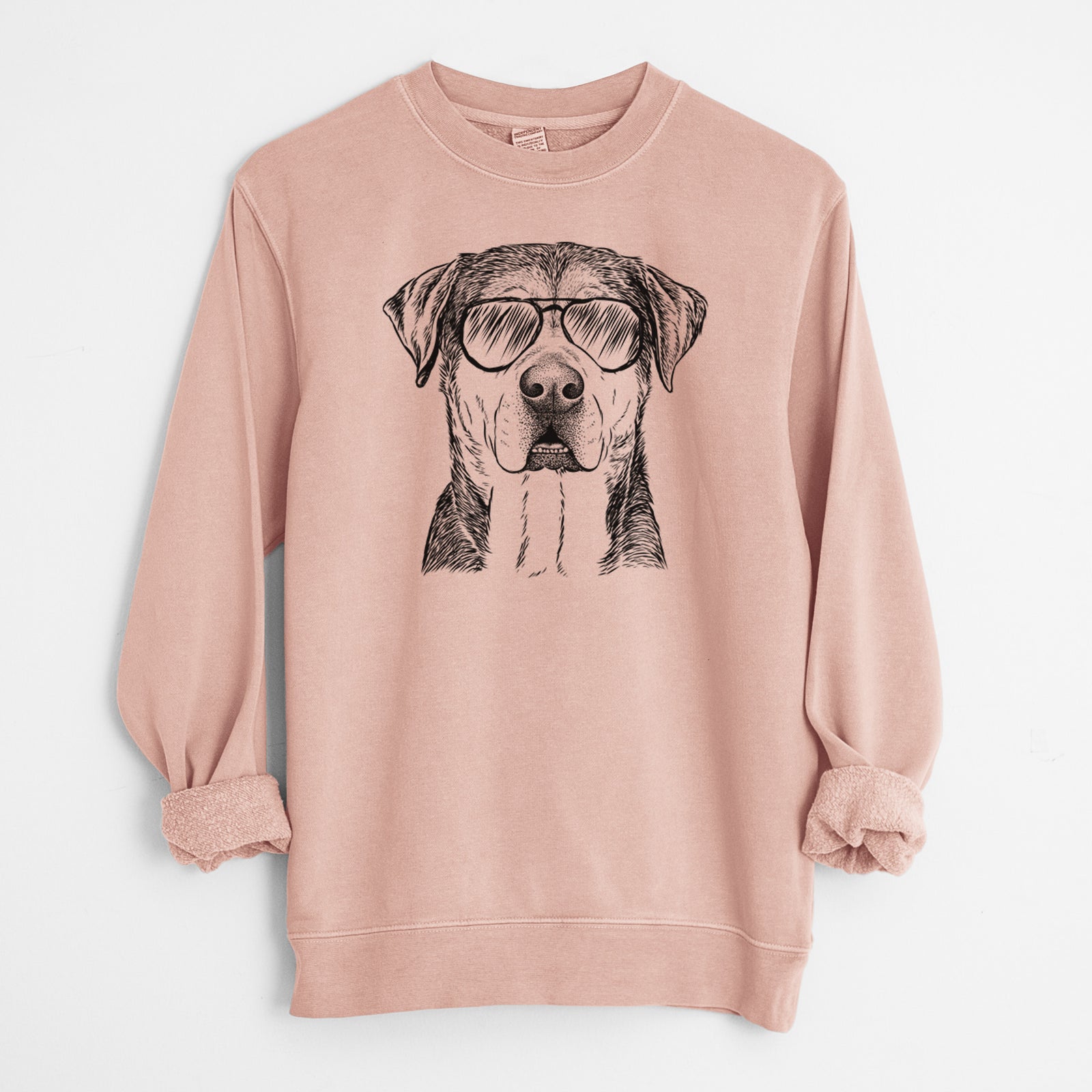 Hand-drawn sketch of Gus the Rottweiler Mix wearing aviator sunglasses on a Dusty Pink Unisex pigment dyed crew sweatshirt