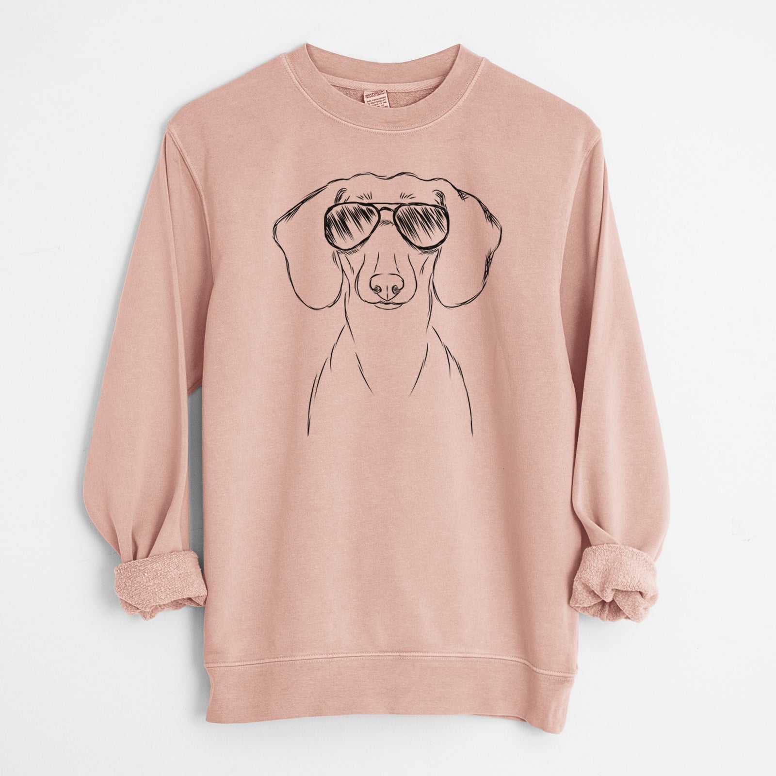 Hand-drawn sketch of Hans the Dachshund wearing aviator sunglasses on a Dusty Pink Unisex pigment dyed crew sweatshirt
