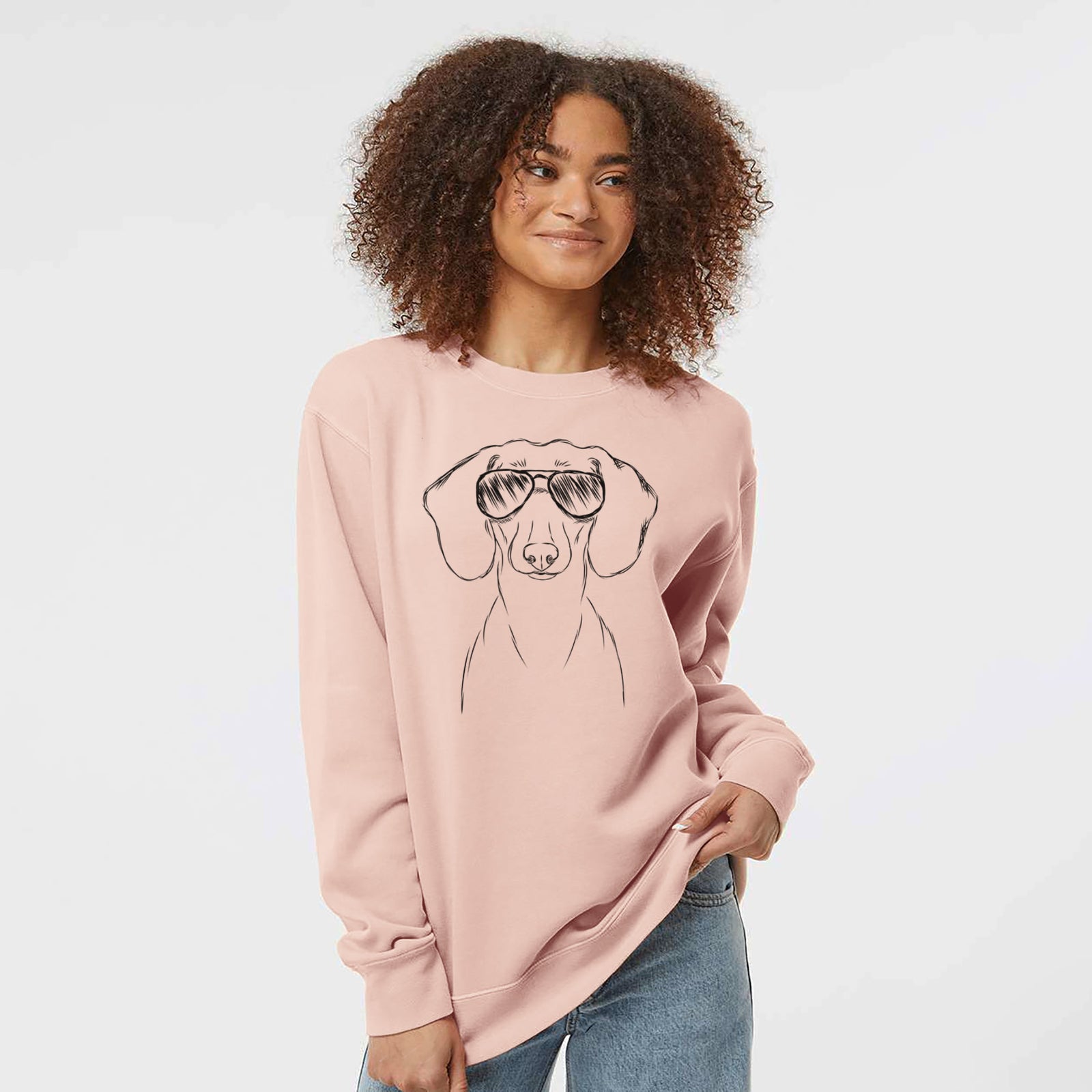 Hand-drawn sketch of Hans the Dachshund wearing aviator sunglasses on a Dusty Pink Unisex pigment dyed crew sweatshirt