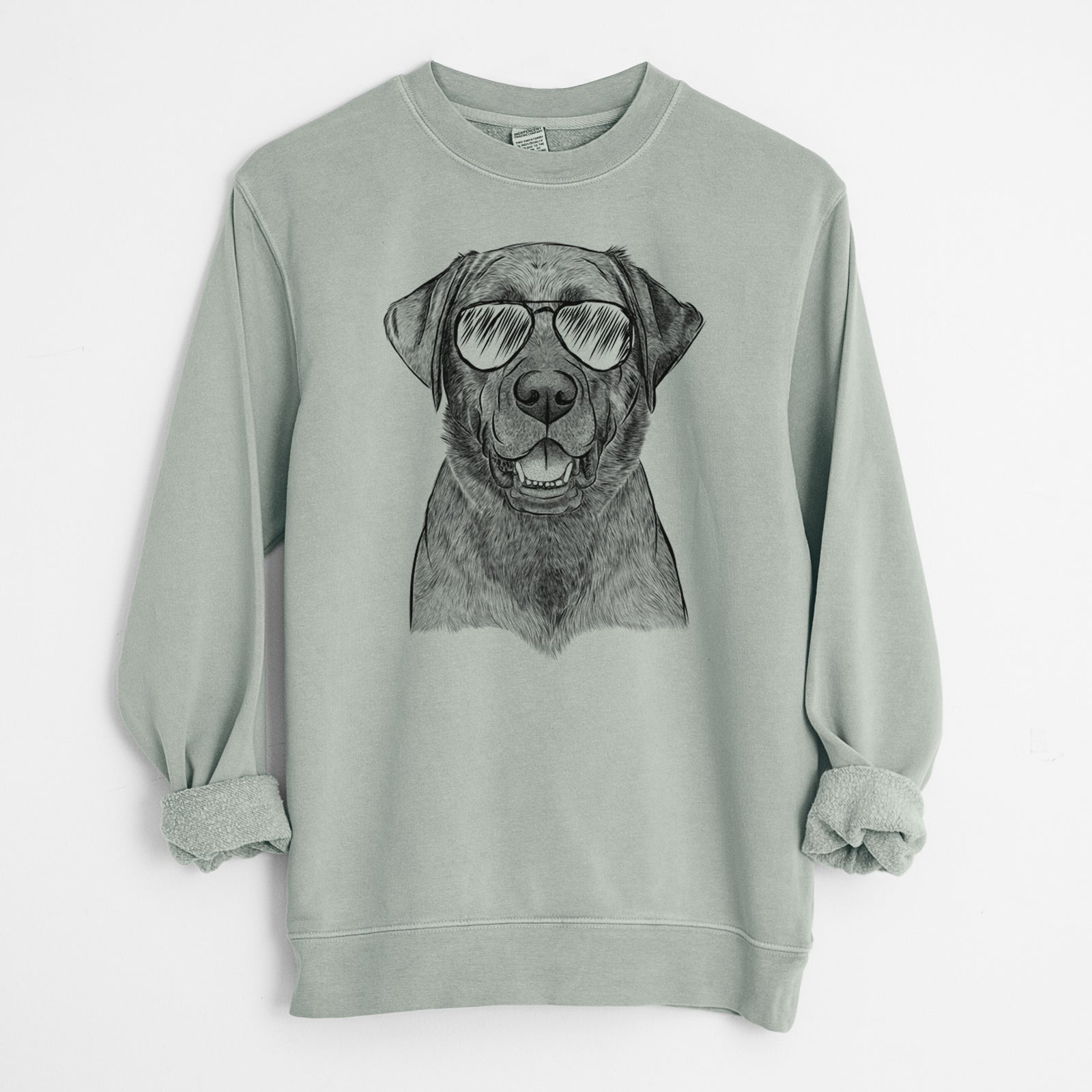 Hand-drawn sketch of Heath the Black Lab wearing aviator sunglasses on a Sage Unisex pigment dyed crew sweatshirt