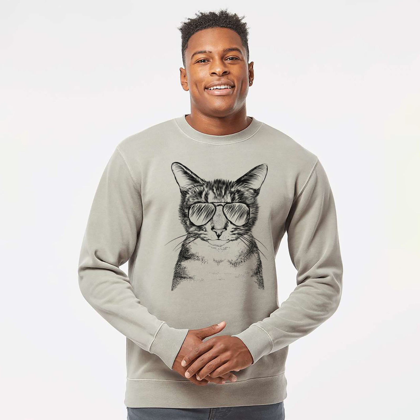 Hand-drawn sketch of Hobbes the Tabby Cat wearing aviator sunglasses on a Cement Unisex pigment dyed crew sweatshirt