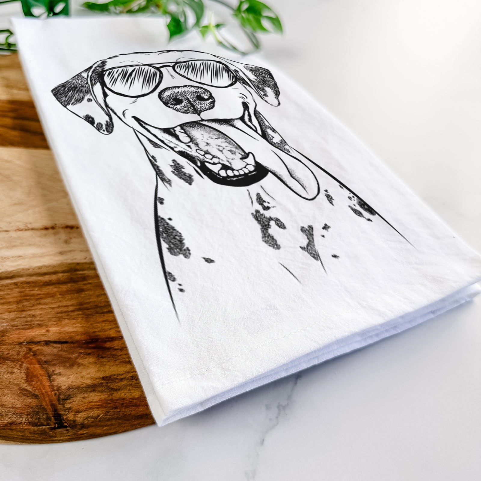 Hand-drawn sketch of Hydro the Dalmatian wearing aviator sunglasses on a tea towel