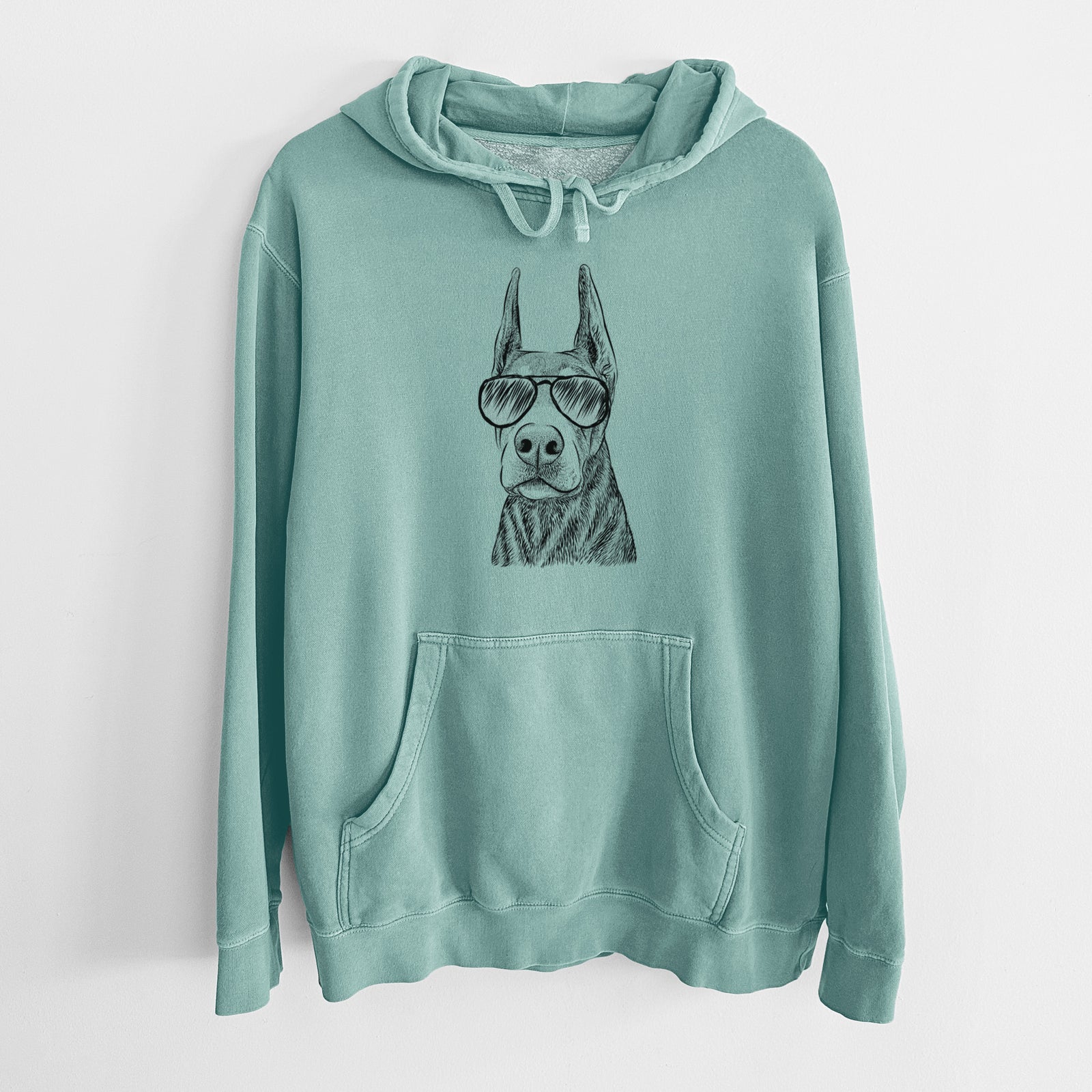 Hand-drawn sketch of Luna the Doberman Pinscher wearing aviator sunglasses on a Mint Unisex pigment dyed hoodie