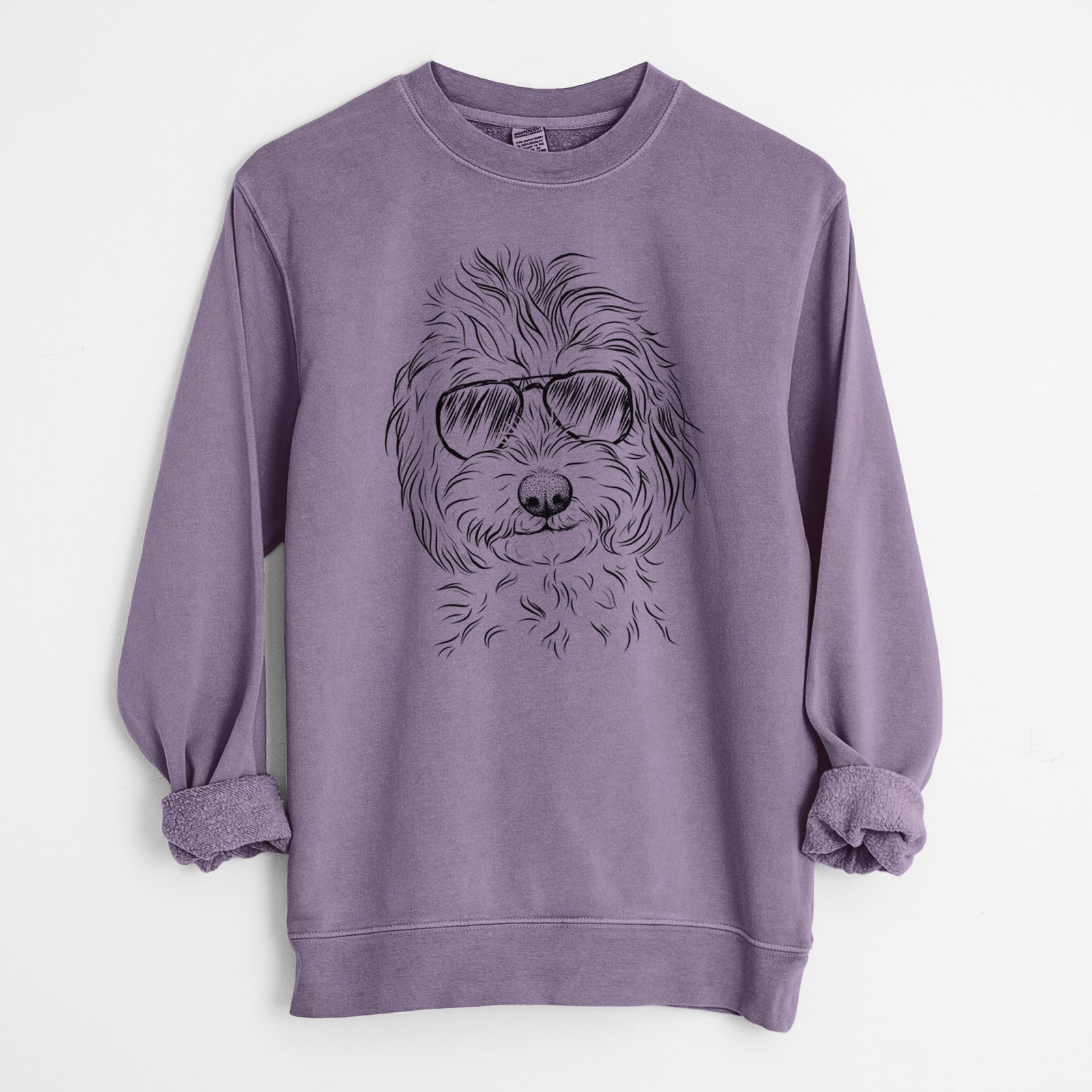 Hand-drawn sketch of Mason the Cavapoo wearing aviator sunglasses on a Plum Unisex pigment dyed crew sweatshirt