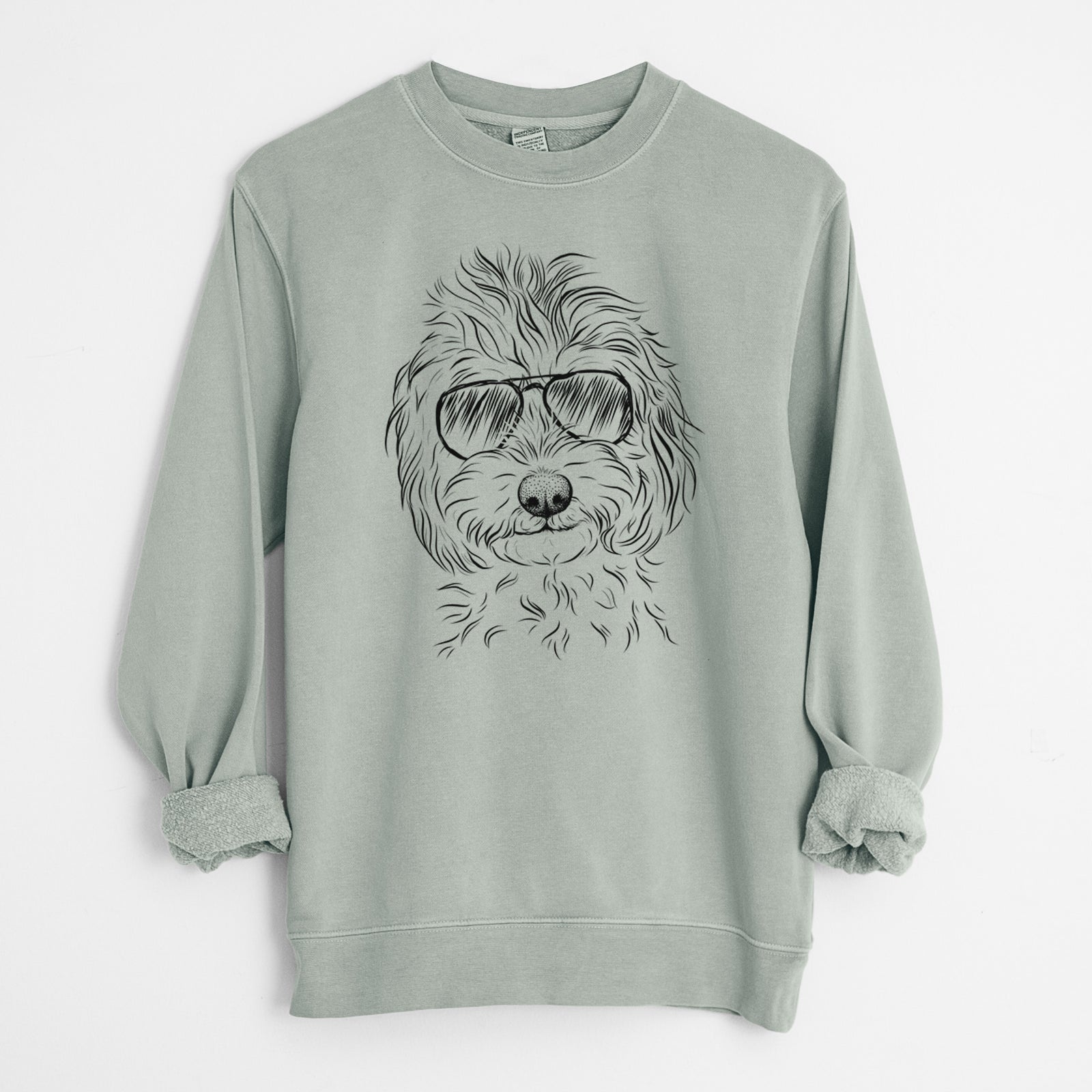 Hand-drawn sketch of Mason the Cavapoo wearing aviator sunglasses on a Sage Unisex pigment dyed crew sweatshirt
