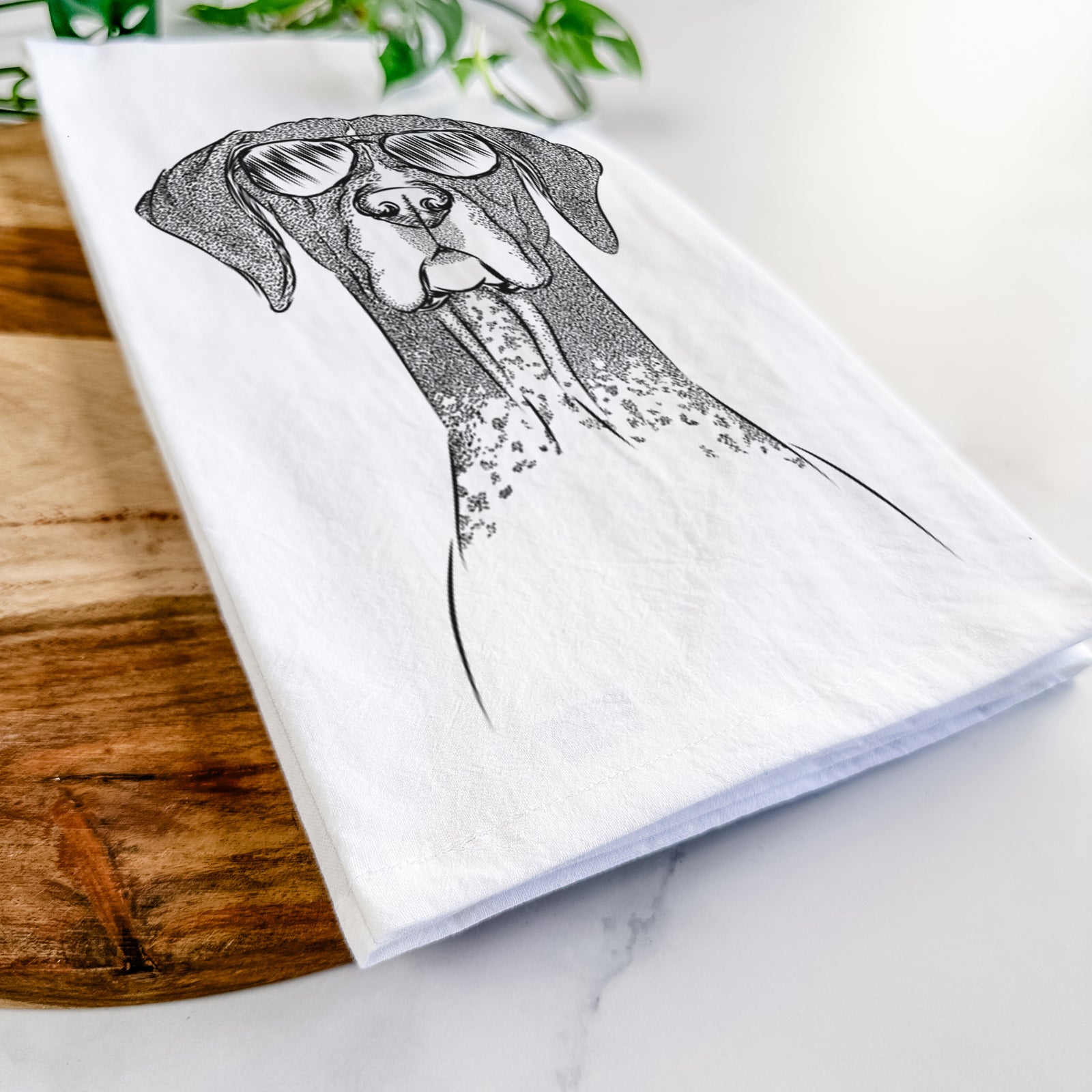 Hand-drawn sketch of Mattis the German Shorthaired Pointer wearing aviator sunglasses on a tea towel