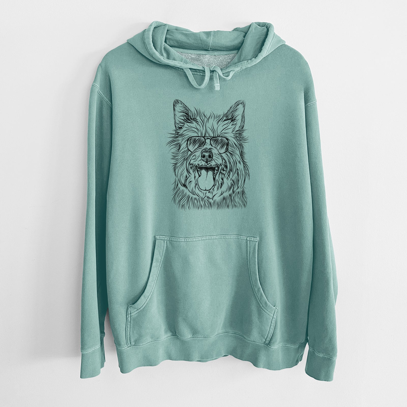 Hand-drawn sketch of Middy the Australian Terrier wearing aviator sunglasses on a Mint Unisex pigment dyed hoodie