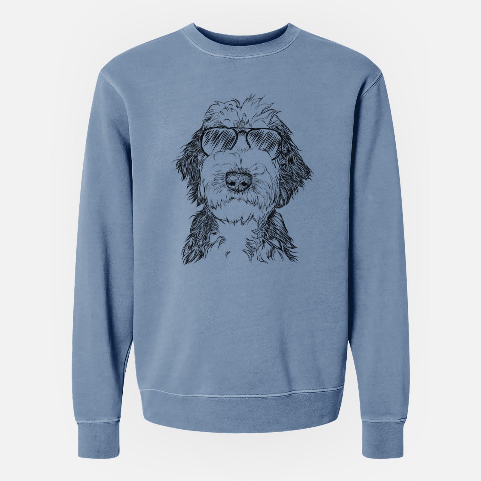 Hand-drawn sketch of Milo Fluff the Sheepadoodle wearing aviator sunglasses on a Slate Blue Unisex pigment dyed crew sweatshirt