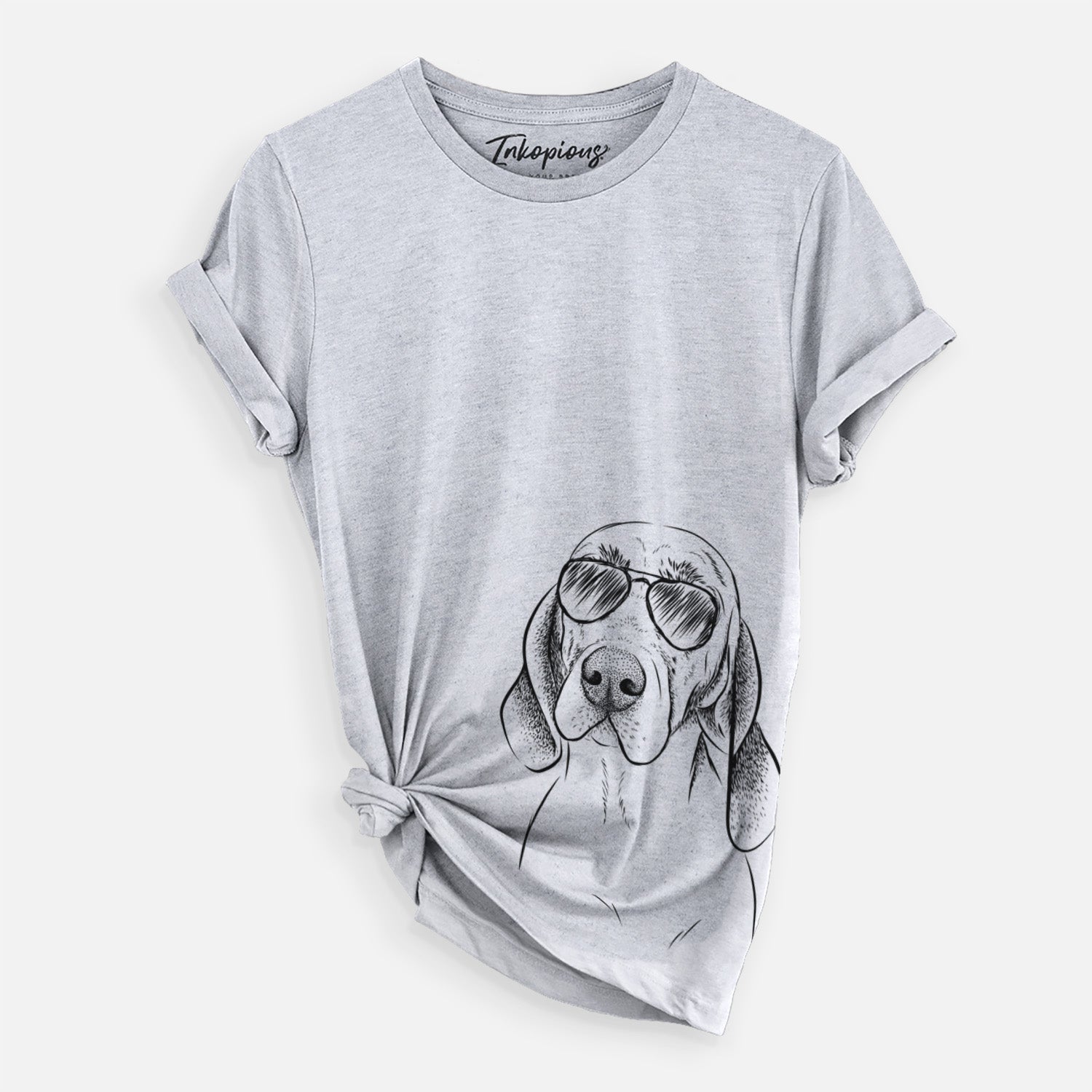 Hand-drawn sketch of Norman the Plott Hound wearing aviator sunglasses on a Grey Unisex crewneck, worn by a woman