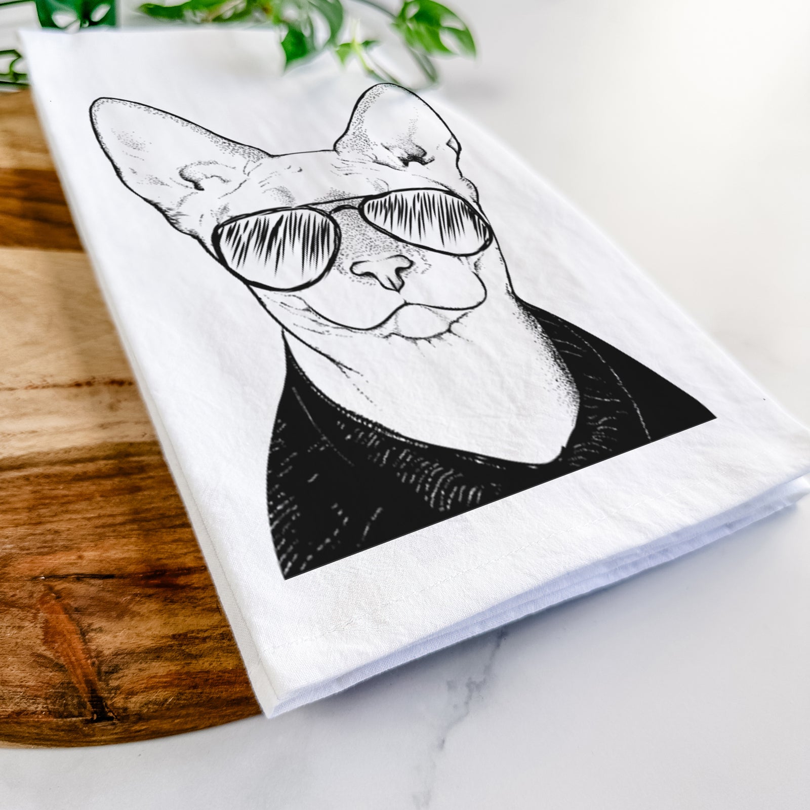 Hand-drawn sketch of Oliver Watson the Sphynx Cat wearing aviator sunglasses on a tea towel