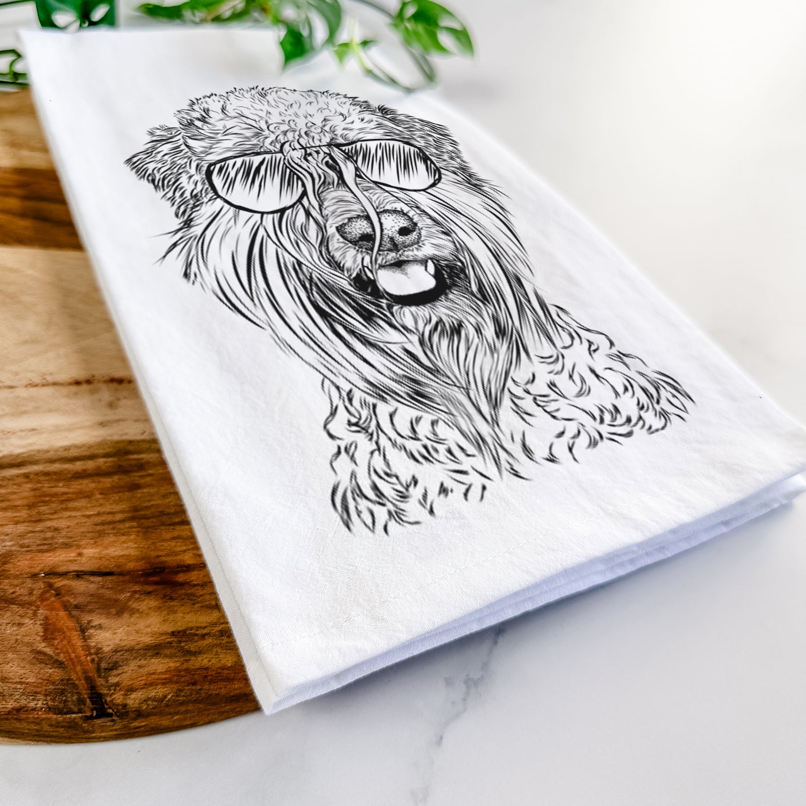 Hand-drawn sketch of Pierre the Soft Coated Wheaten Terrier wearing aviator sunglasses on a tea towel