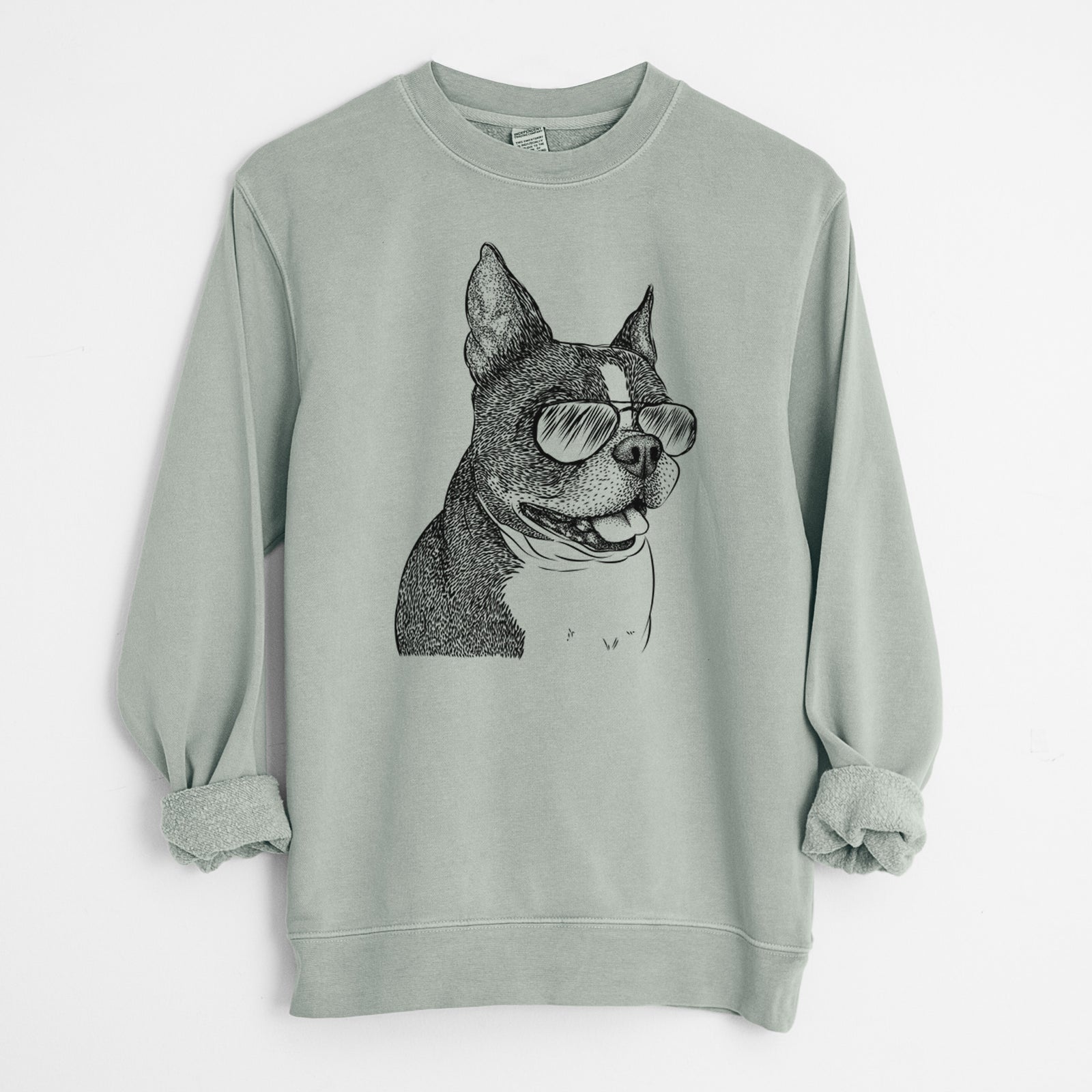 Hand-drawn sketch of Ralphie the Boston Terrier wearing aviator sunglasses on a Sage Unisex pigment dyed crew sweatshirt
