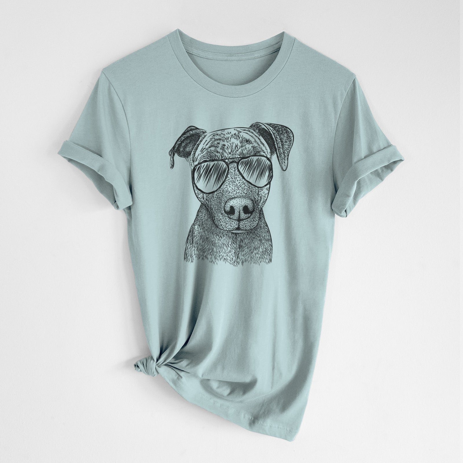 Hand-drawn sketch of Reeses the Pitbull wearing aviator sunglasses on a Dusty Blue Unisex crewneck, worn by a woman