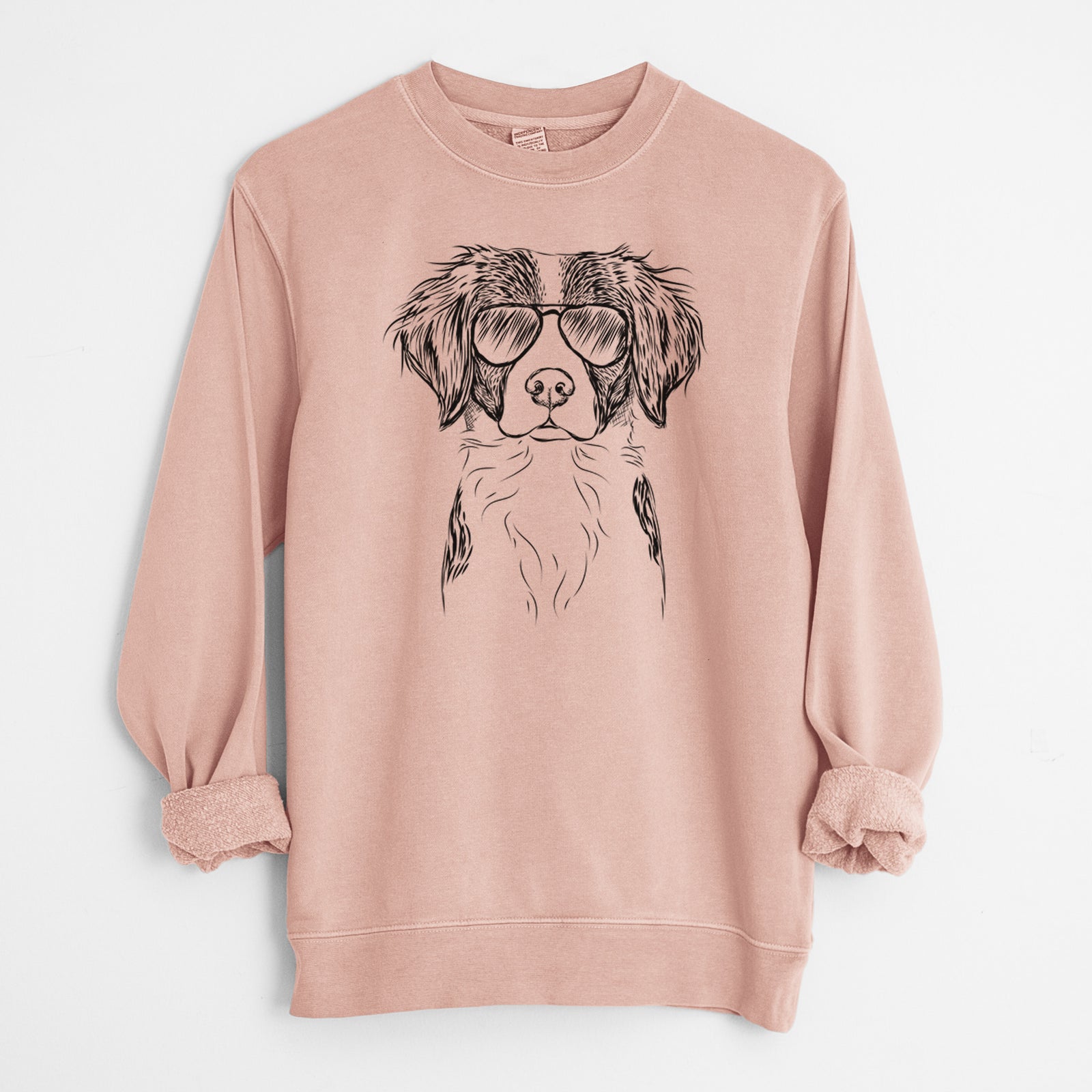 Hand-drawn sketch of Remi the Brittany wearing aviator sunglasses on a Dusty Pink Unisex pigment dyed crew sweatshirt