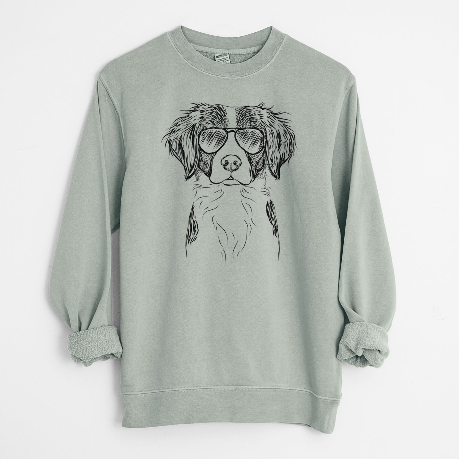 Hand-drawn sketch of Remi the Brittany wearing aviator sunglasses on a Sage Unisex pigment dyed crew sweatshirt