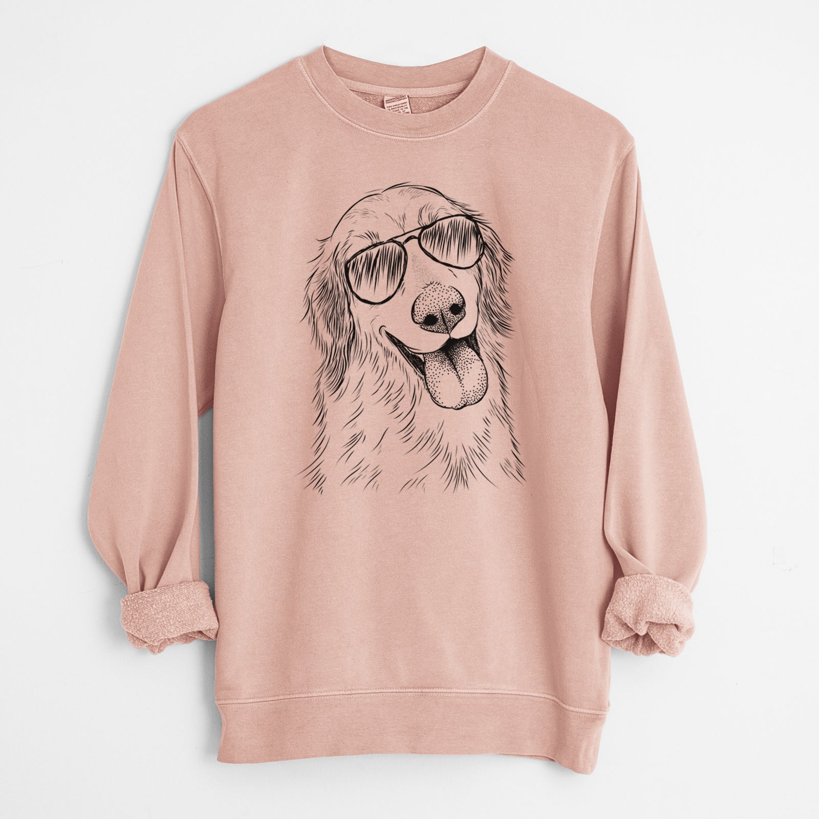 Hand-drawn sketch of Shelby the Golden Retriever wearing aviator sunglasses on a Dusty Pink Unisex pigment dyed crew sweatshirt