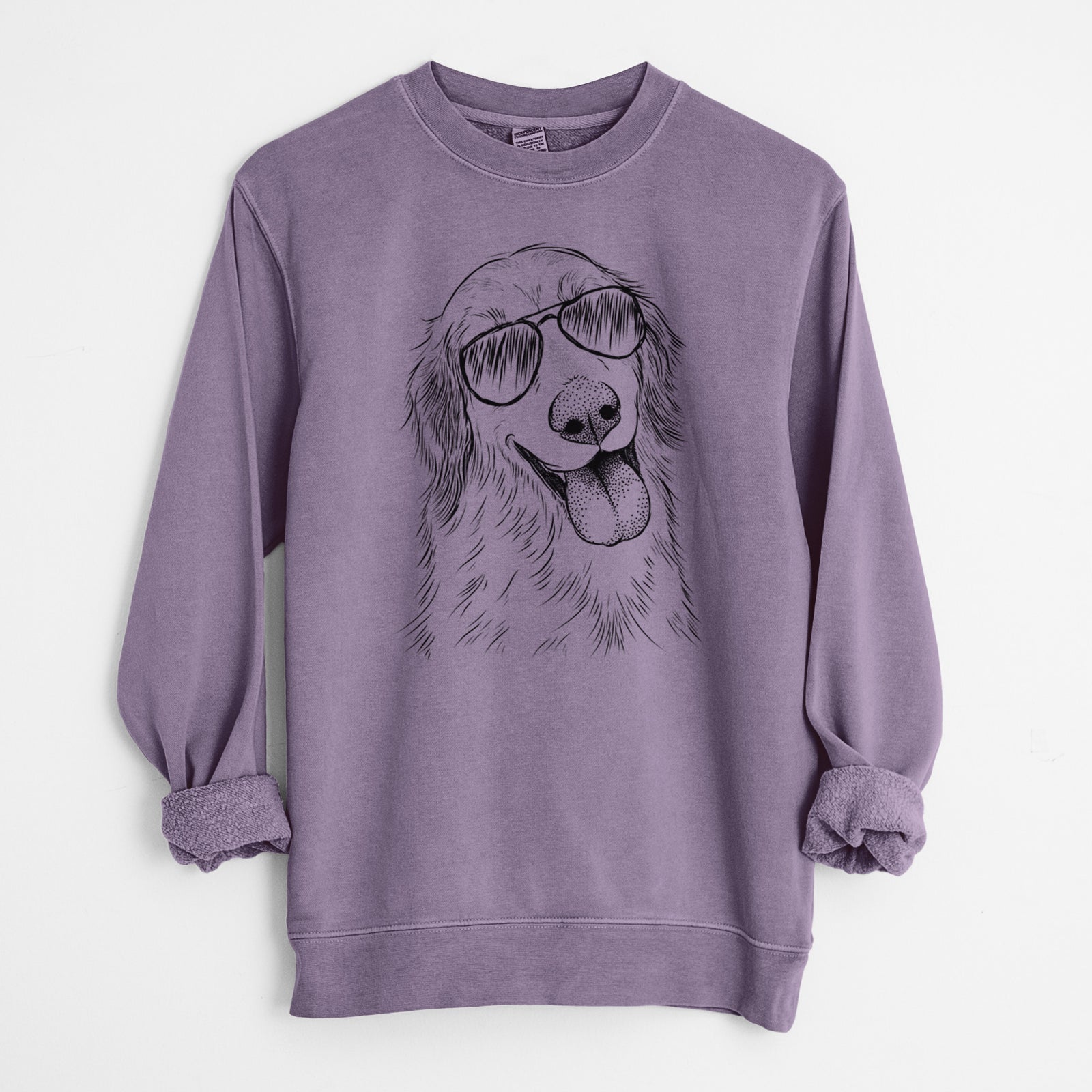 Hand-drawn sketch of Shelby the Golden Retriever wearing aviator sunglasses on a Plum Unisex pigment dyed crew sweatshirt