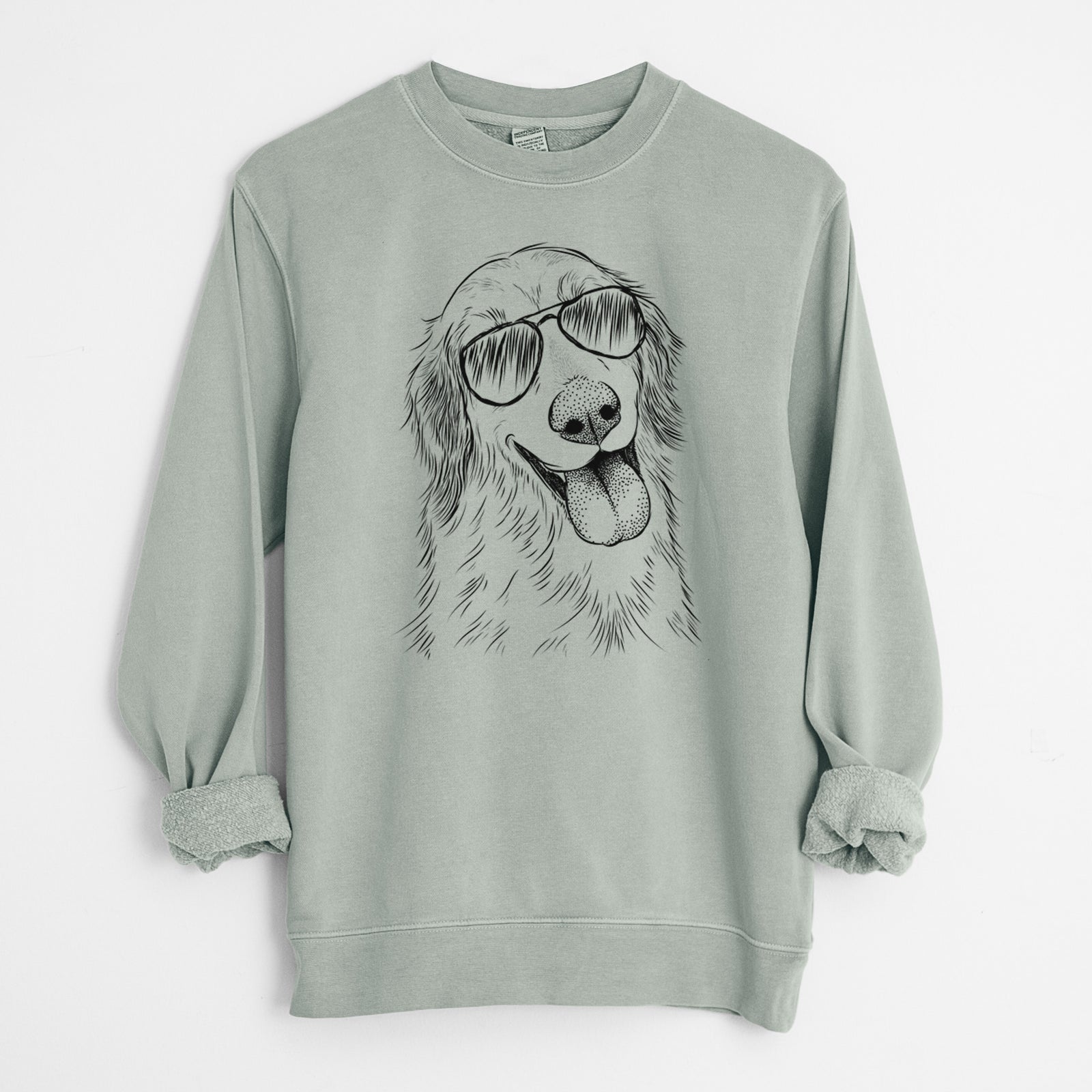 Hand-drawn sketch of Shelby the Golden Retriever wearing aviator sunglasses on a Sage Unisex pigment dyed crew sweatshirt