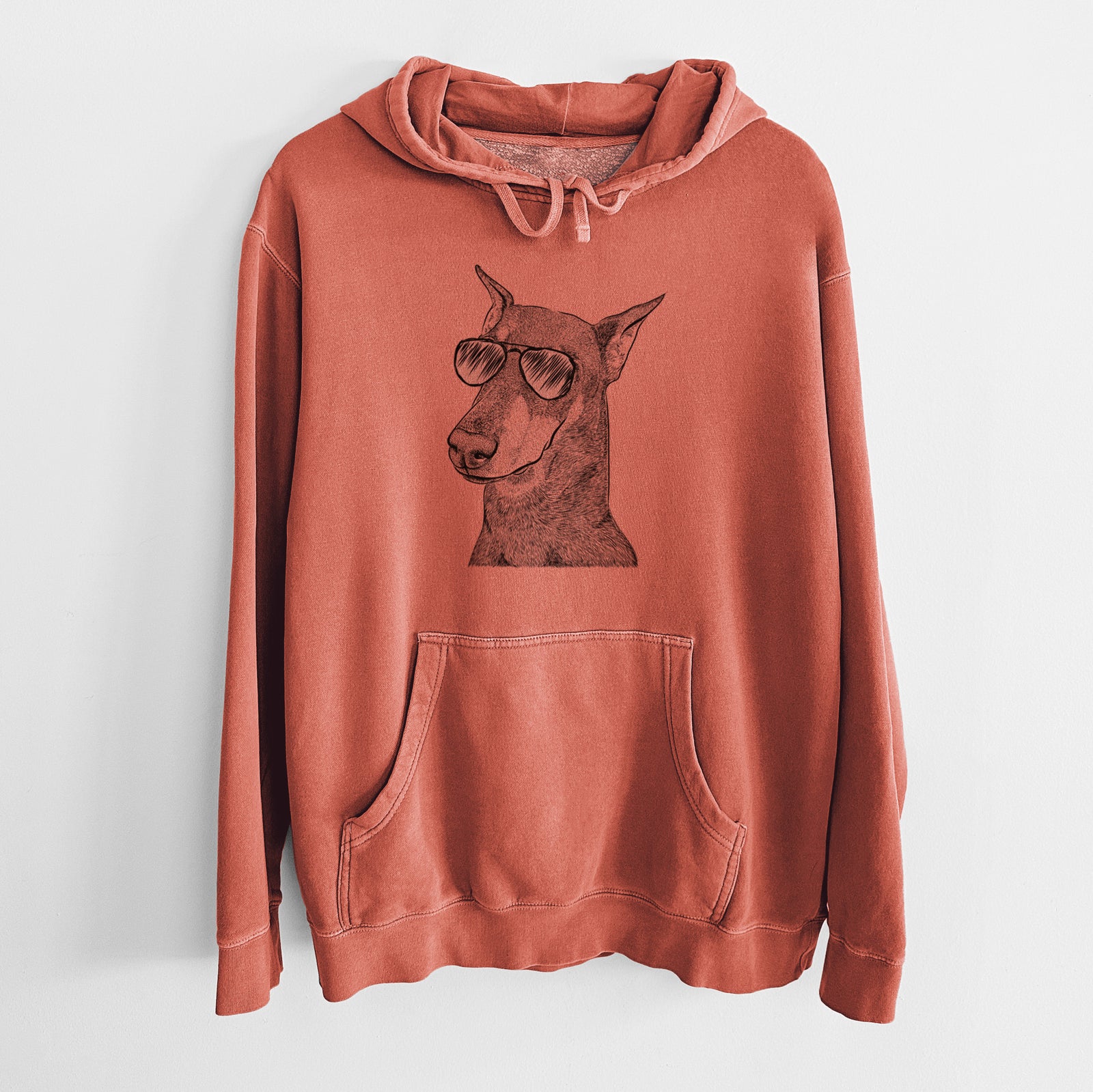 Hand-drawn sketch of Shelby the Doberman Pinscher wearing aviator sunglasses on an Amber Unisex pigment dyed hoodie