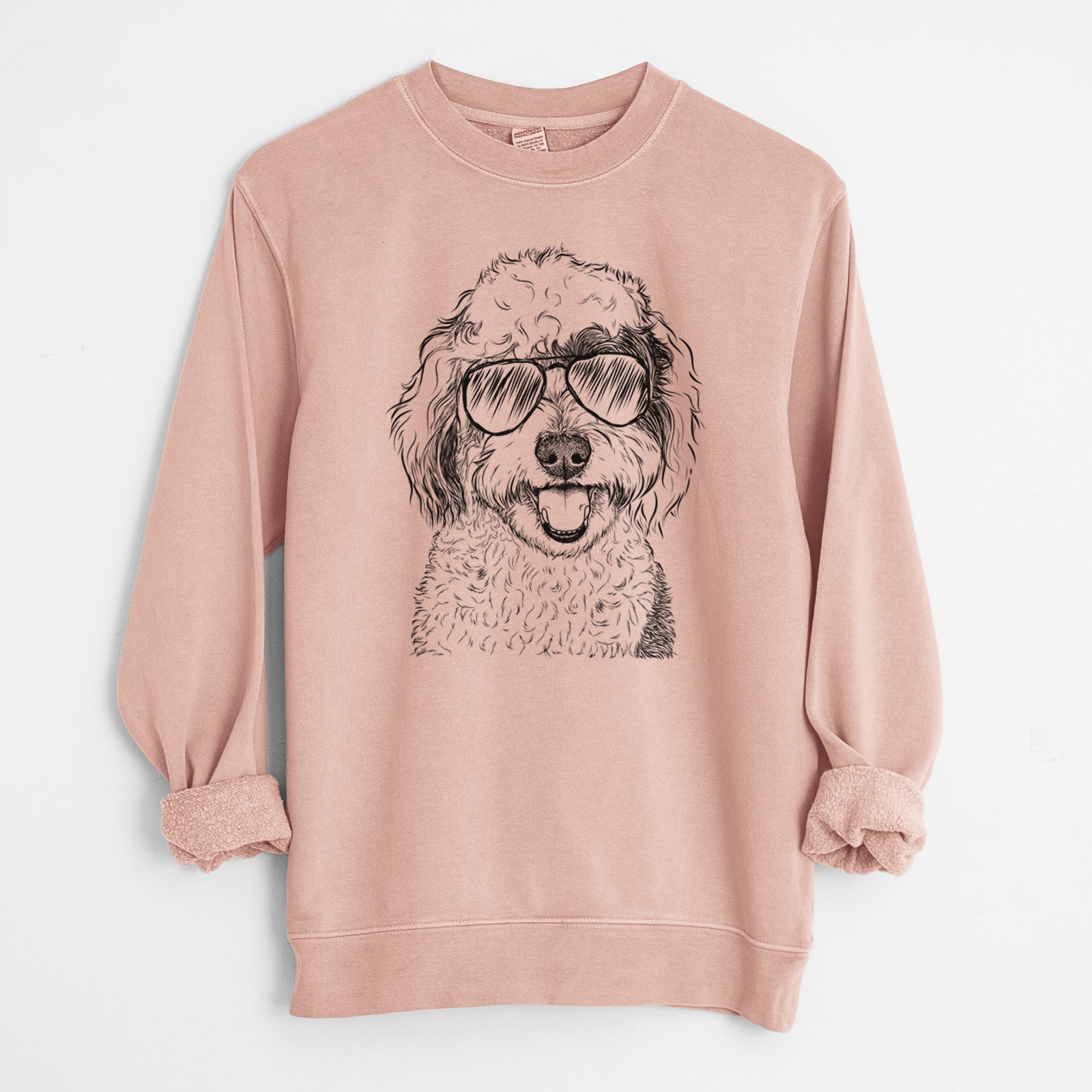 Hand-drawn sketch of Sherlock the Sheepadoodle wearing aviator sunglasses on a Dusty Pink Unisex pigment dyed crew sweatshirt