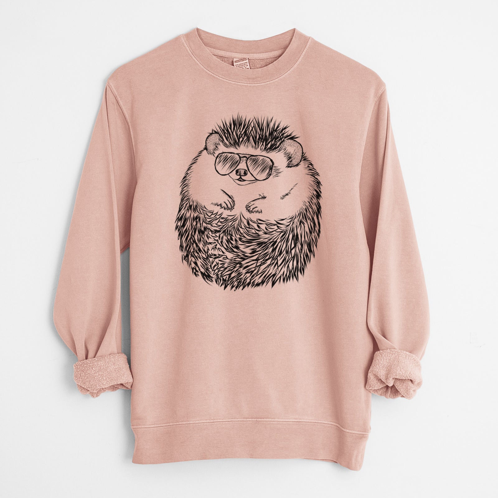 Hand-drawn sketch of Sid the Hedgehog wearing aviator sunglasses on a Dusty Pink Unisex pigment dyed crew sweatshirt