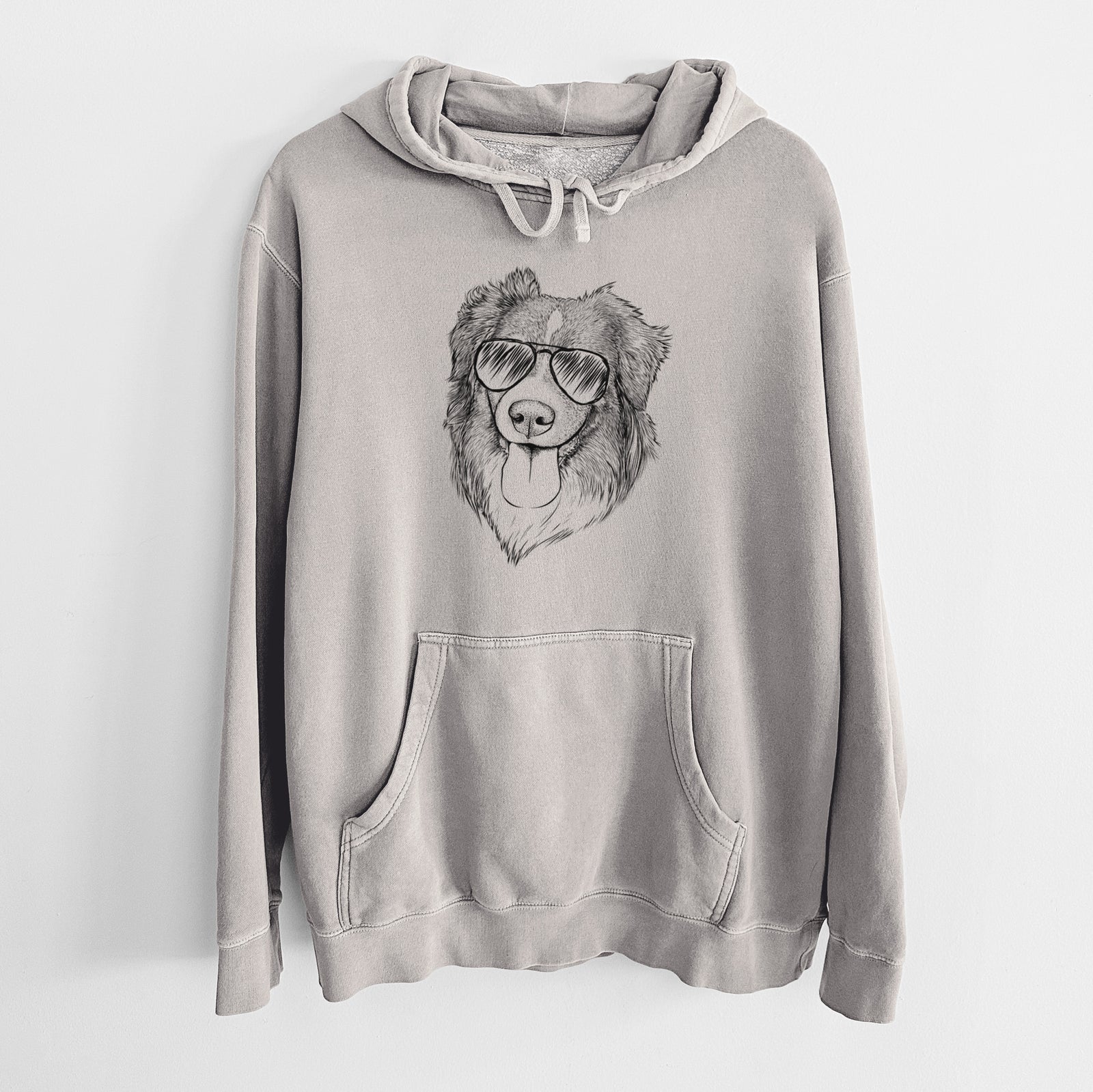 Hand-drawn sketch of Siena the Australian Shepherd wearing aviator sunglasses on a Cement Unisex pigment dyed hoodie