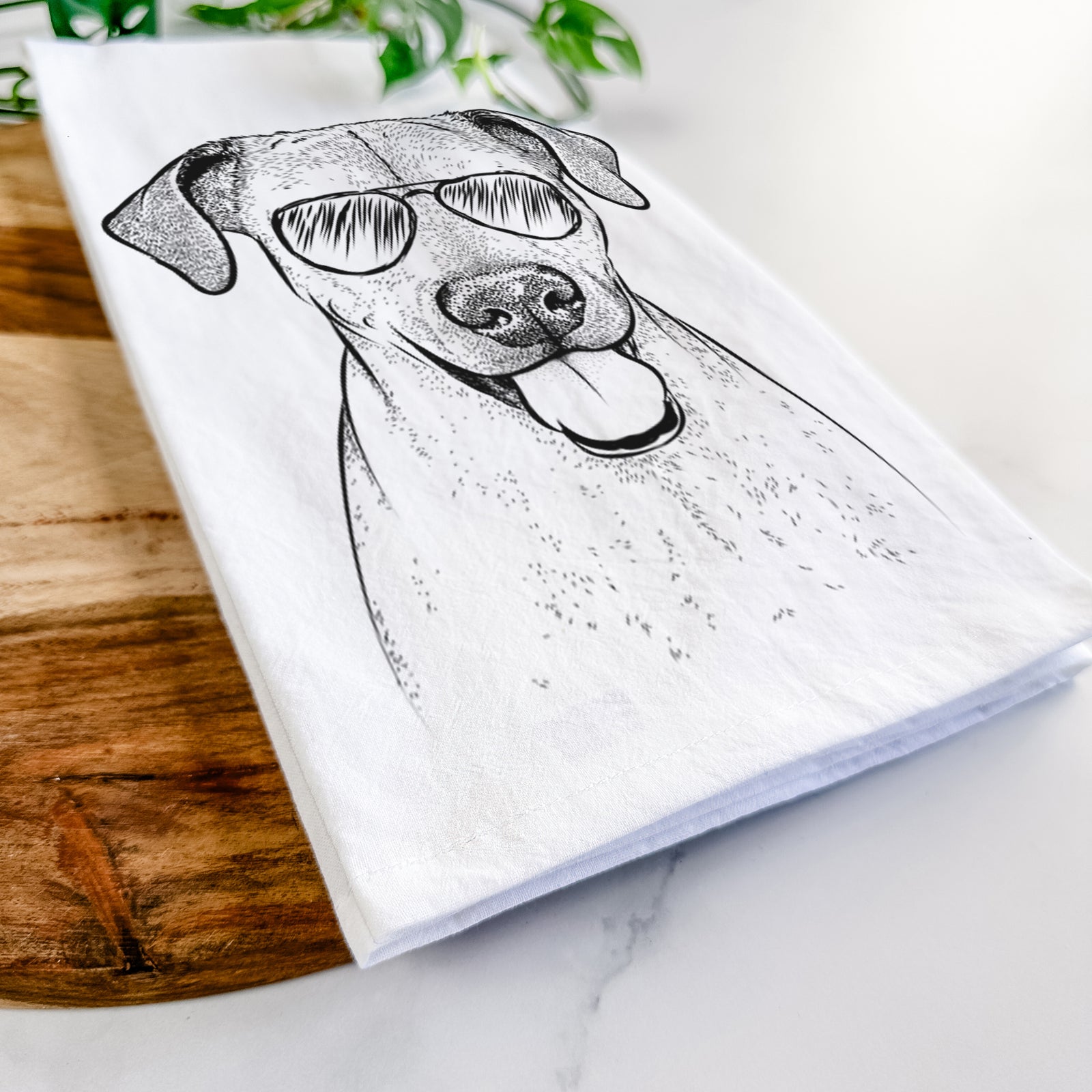 Hand-drawn sketch of Sugar the American Staffordshire Mix wearing aviator sunglasses on a tea towel